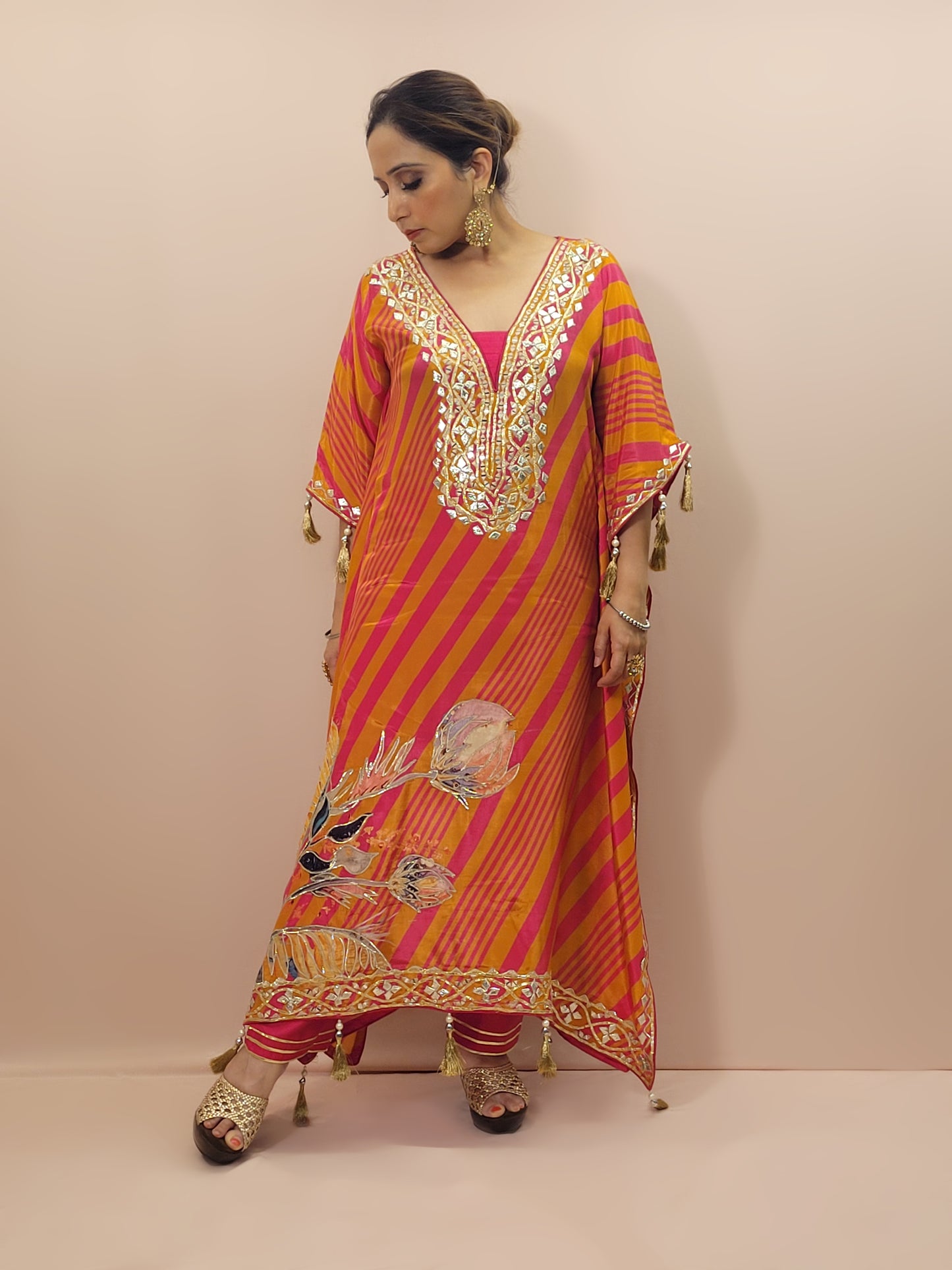 Orange Rani Kaftan with Pants. Gota and Applique work.