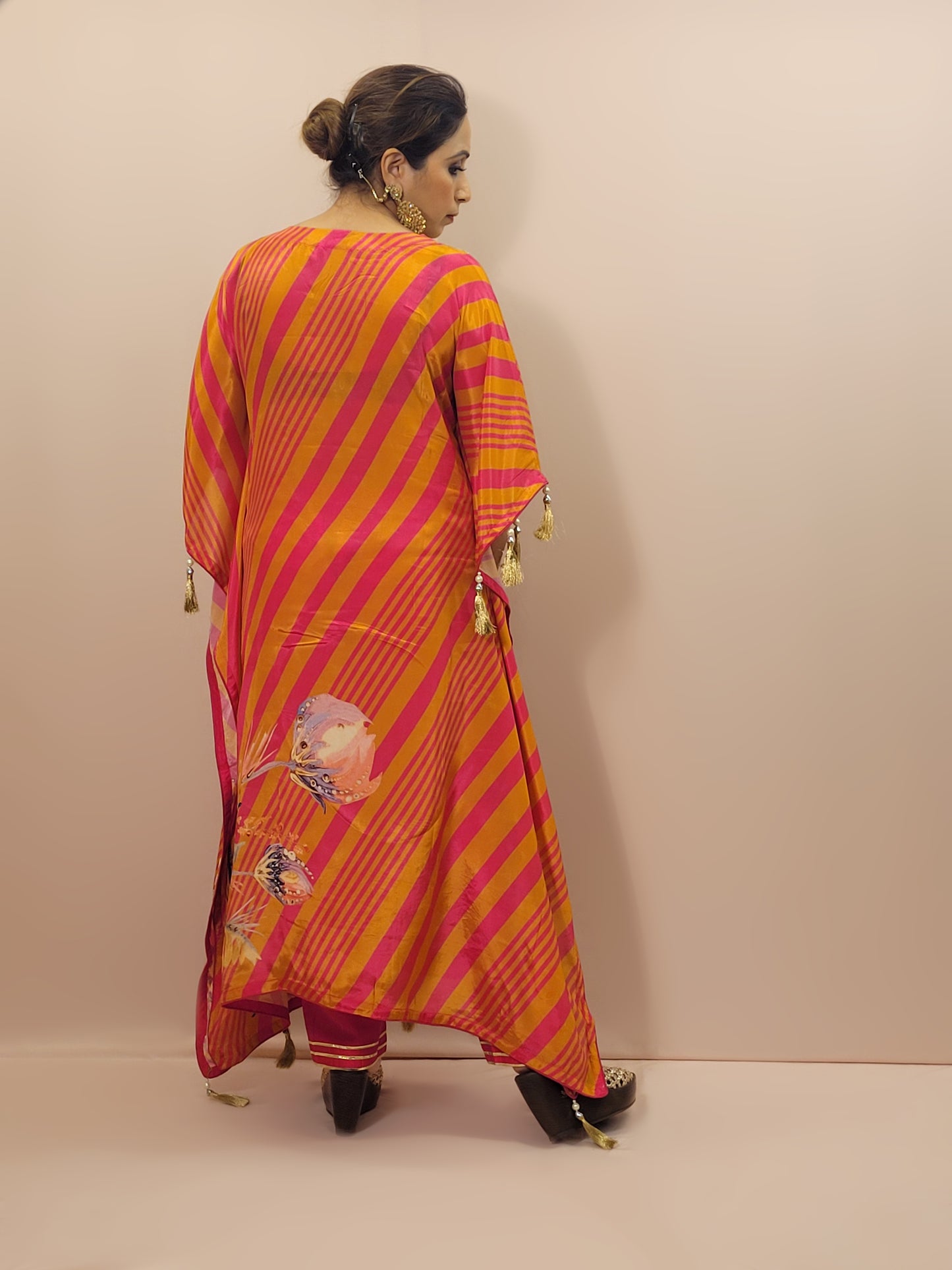 Orange Rani Kaftan with Pants. Gota and Applique work.