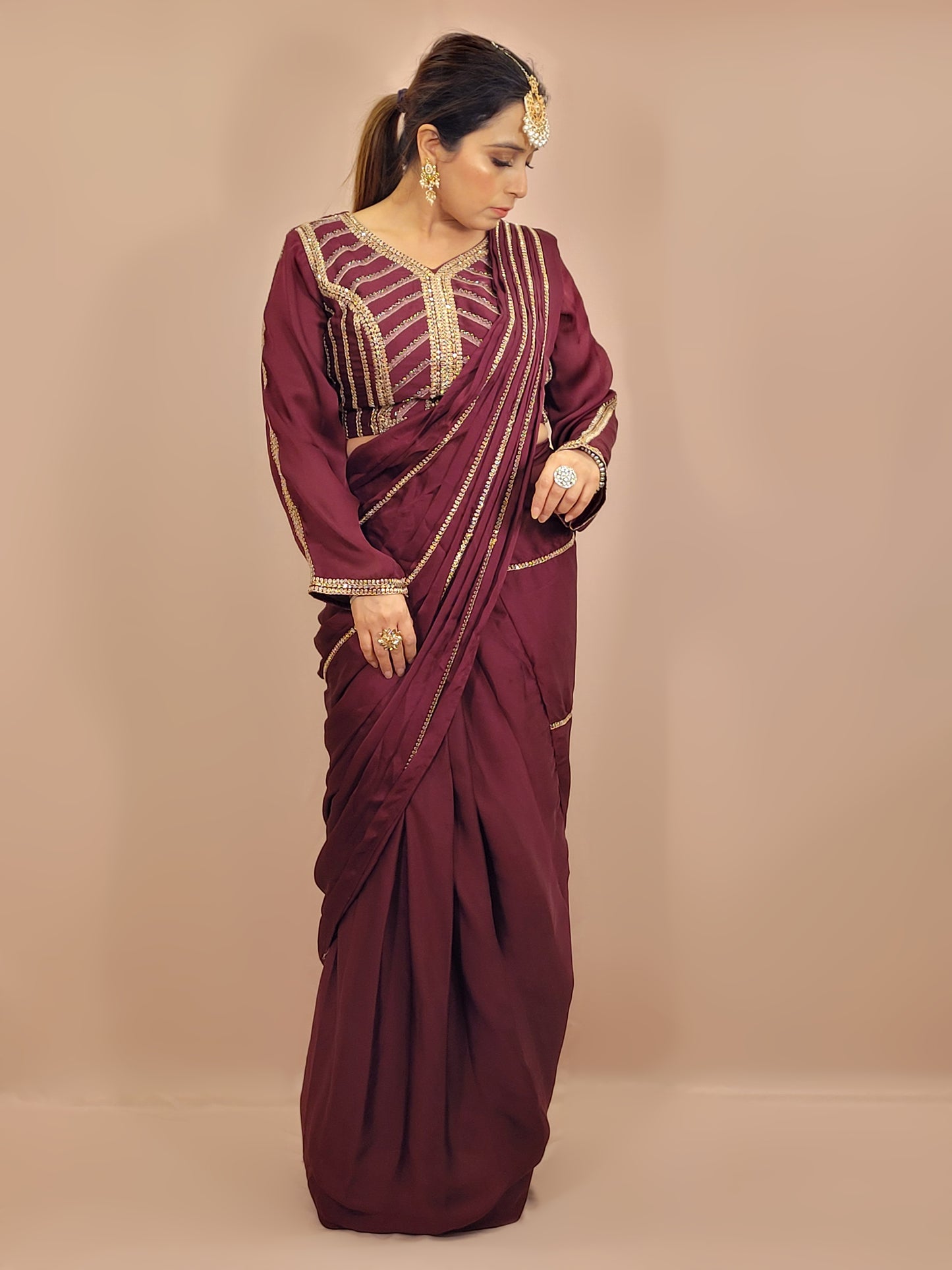 Wine Armani Ready to Wear Saree with Stitched Blouse. Zari Resham and Cutdana work on Blouse and Palla.