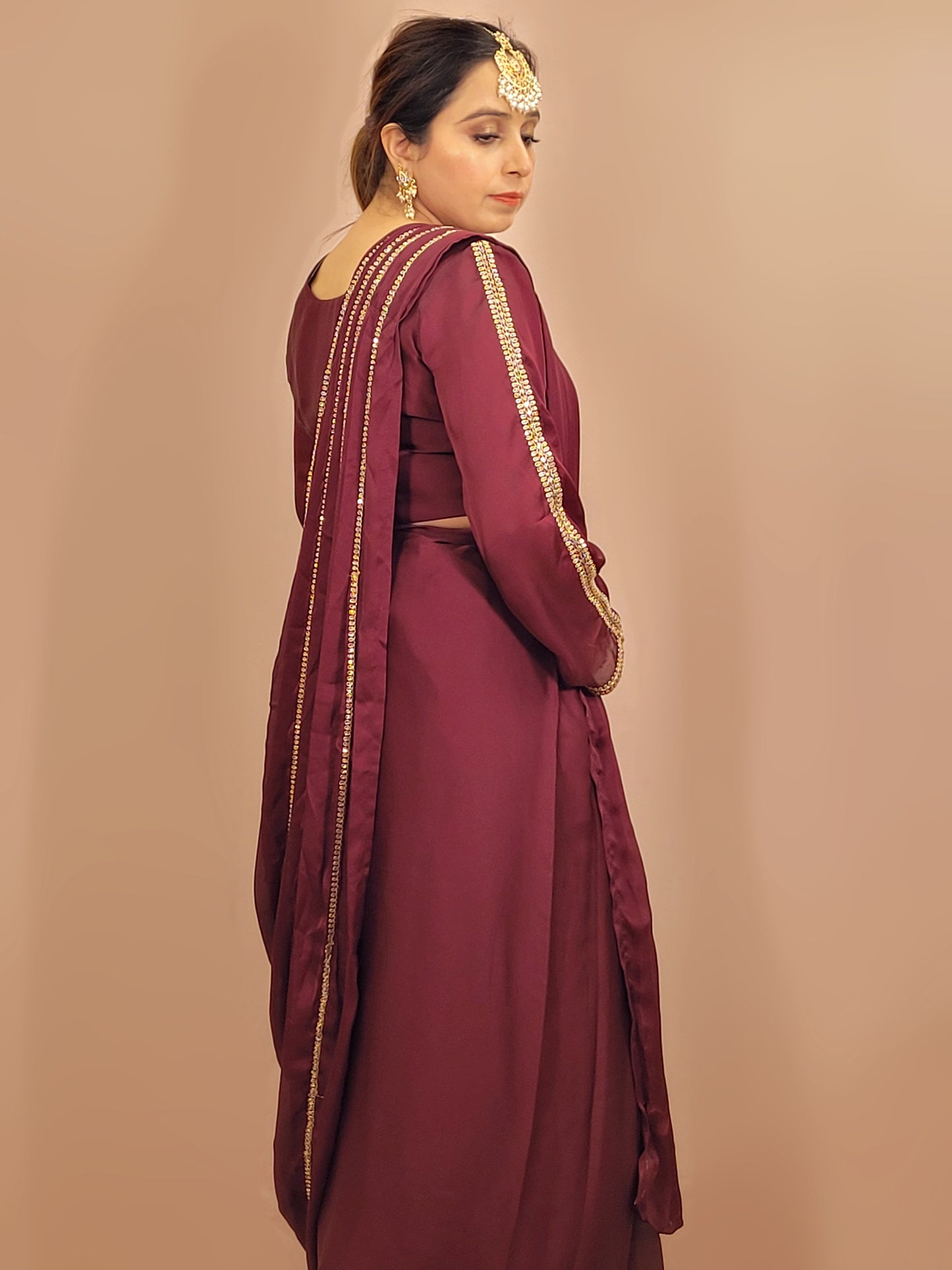 Wine Armani Ready to Wear Saree with Stitched Blouse. Zari Resham and Cutdana work on Blouse and Palla.