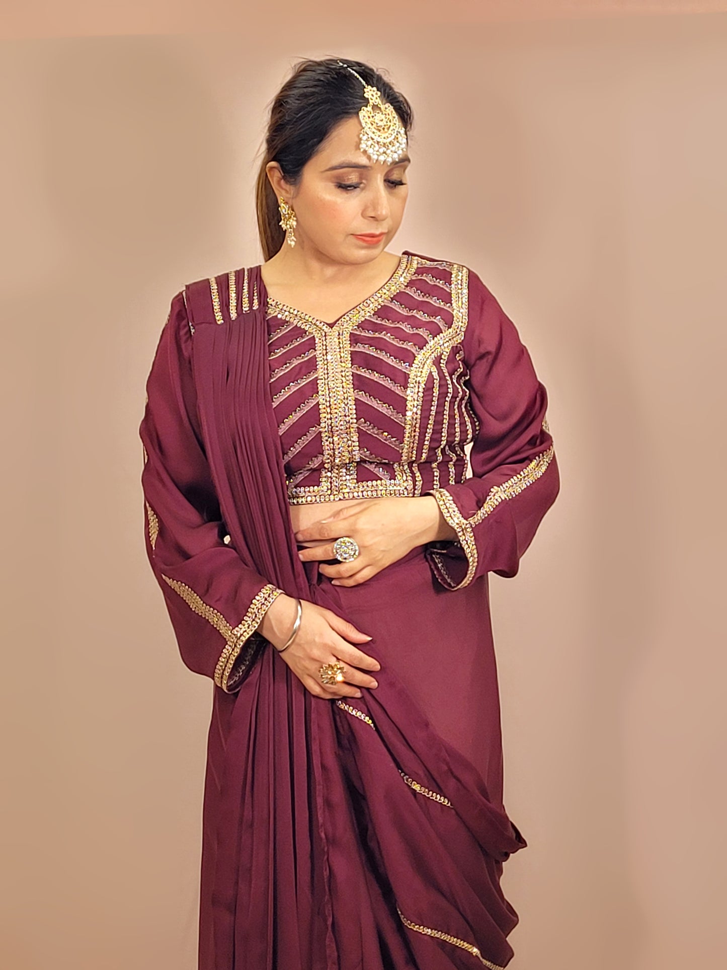 Wine Armani Ready to Wear Saree with Stitched Blouse. Zari Resham and Cutdana work on Blouse and Palla.