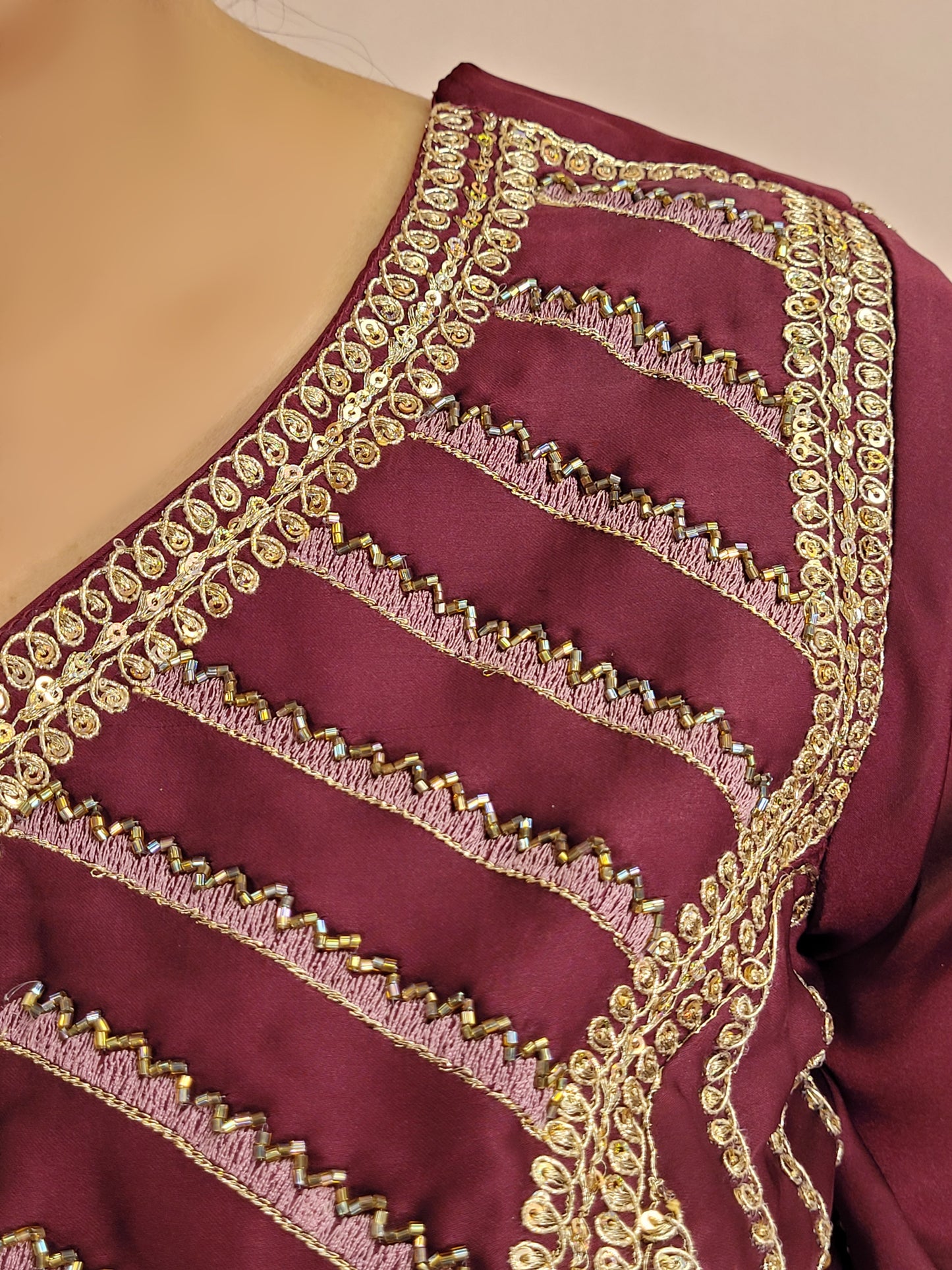 Wine Armani Ready to Wear Saree with Stitched Blouse. Zari Resham and Cutdana work on Blouse and Palla.