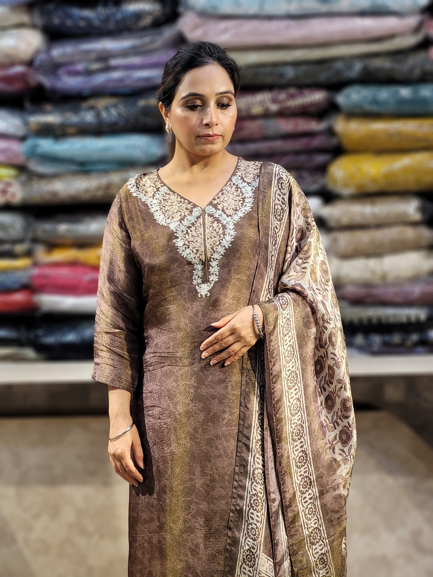 Coffee Shimmer Straight Suit with Badla Zari Neckline and fancy Print Dupatta.