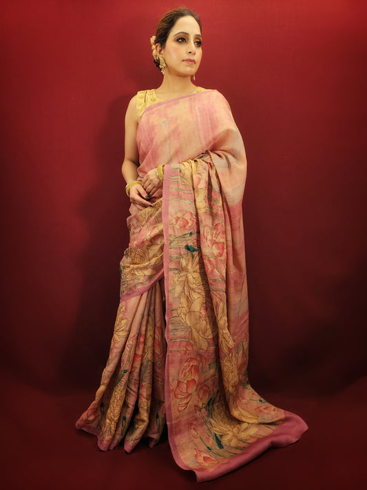 Drape yourself in timeless elegance with this stunning onion pink silk saree. Crafted from pure silk, this saree offers a luxurious feel and a beautiful drape that flatters any figure. The captivating brush print design adds a touch of modern flair, while the chain stitch highlighted motifs lend a timeless sophistication.