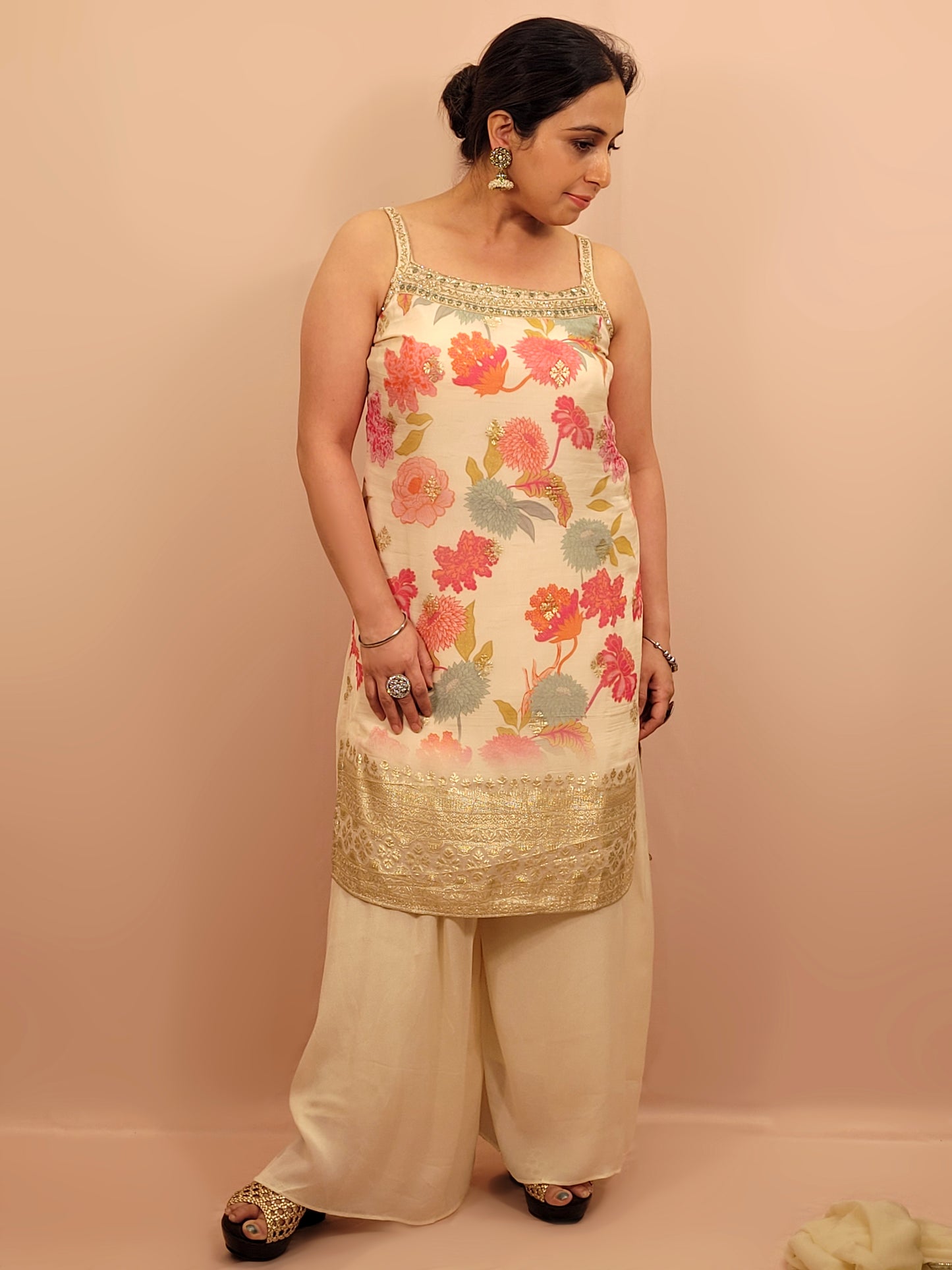 Creme chinon floral print kurti palazzo set. Cutdana, zarkan and dabka work.