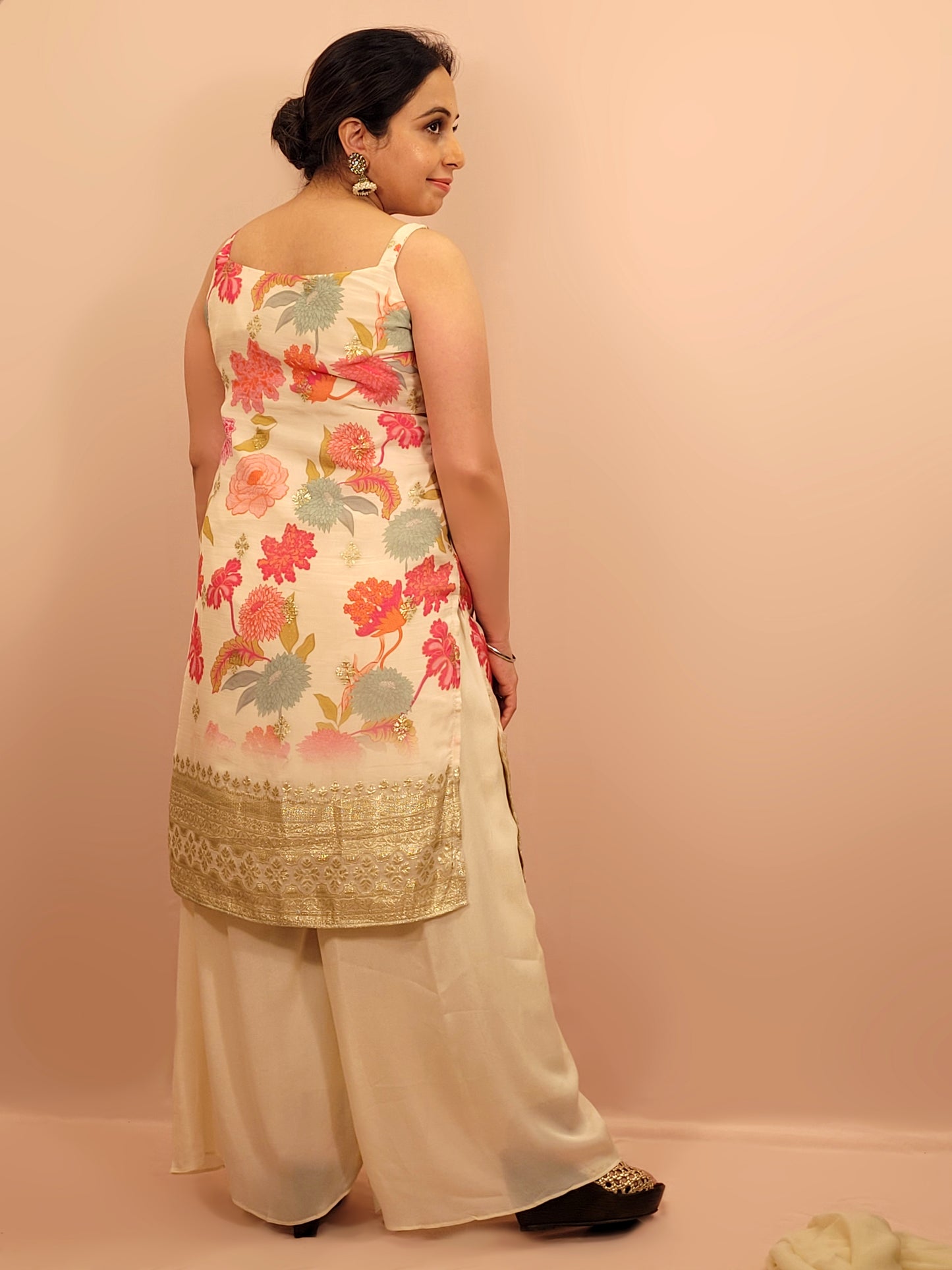 Creme chinon floral print kurti palazzo set. Cutdana, zarkan and dabka work.