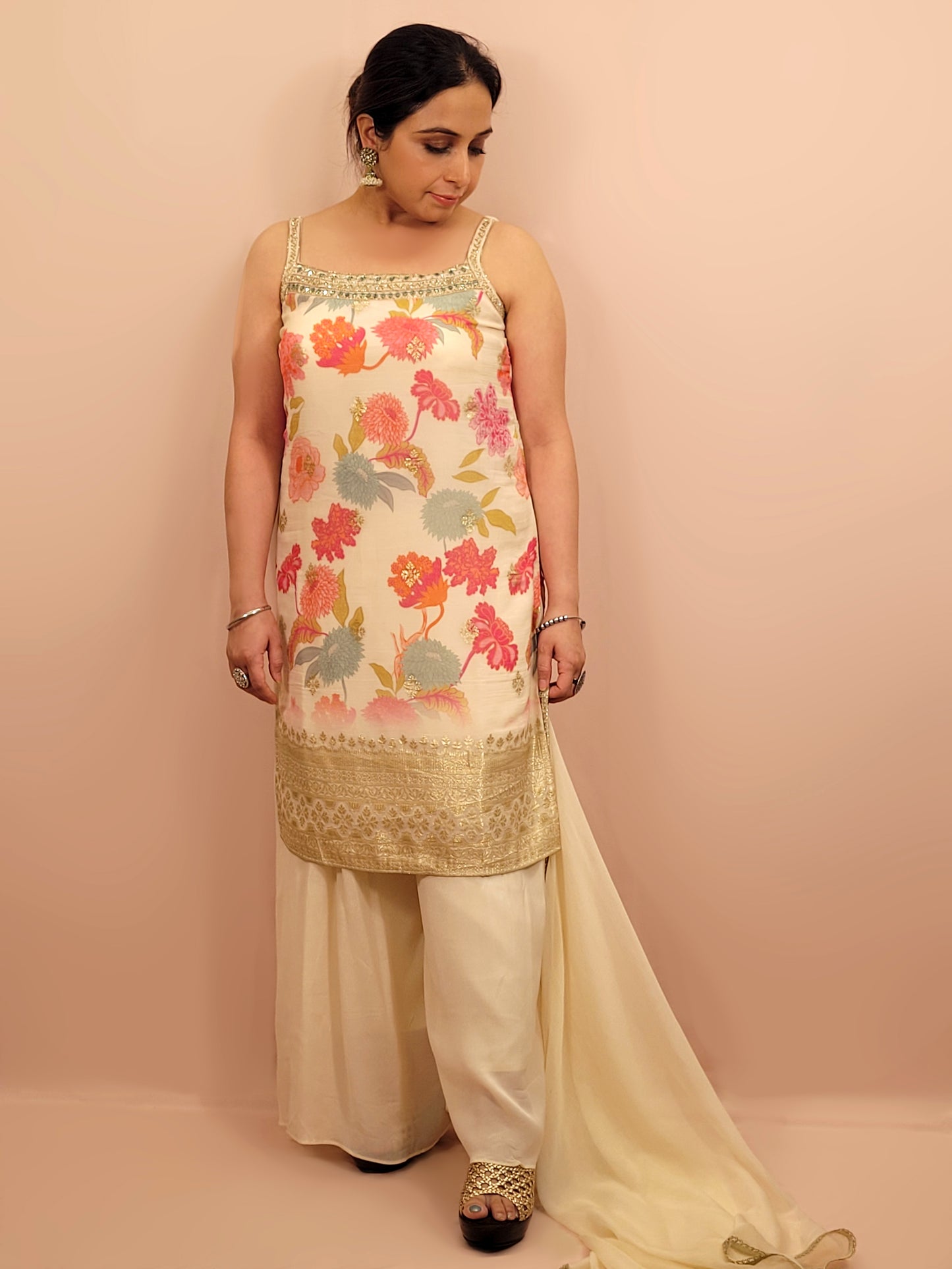 Creme chinon floral print kurti palazzo set. Cutdana, zarkan and dabka work.