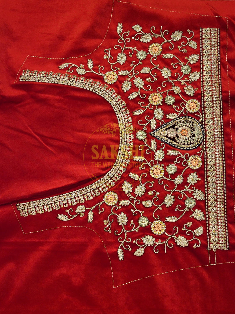 Bridal Red Lehenga adorned with intricate multicolor embroidery