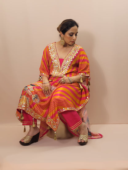 Orange Rani Kaftan with Pants. Gota and Applique work.