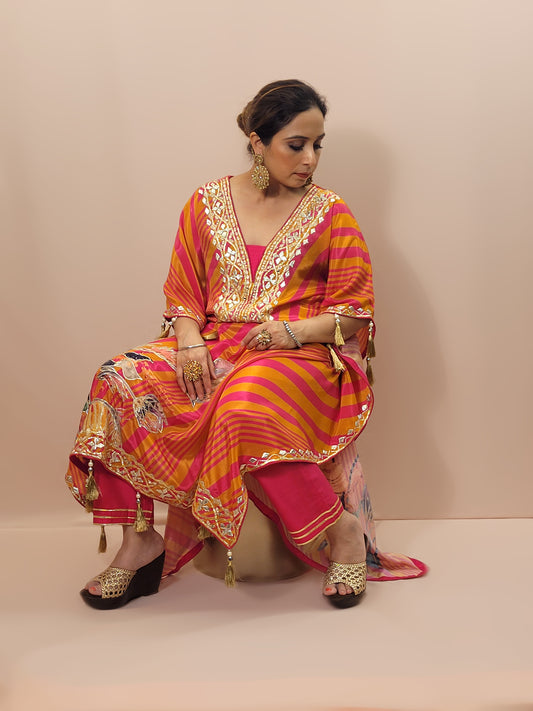 Orange Rani Kaftan with Pants. Gota and Applique work.