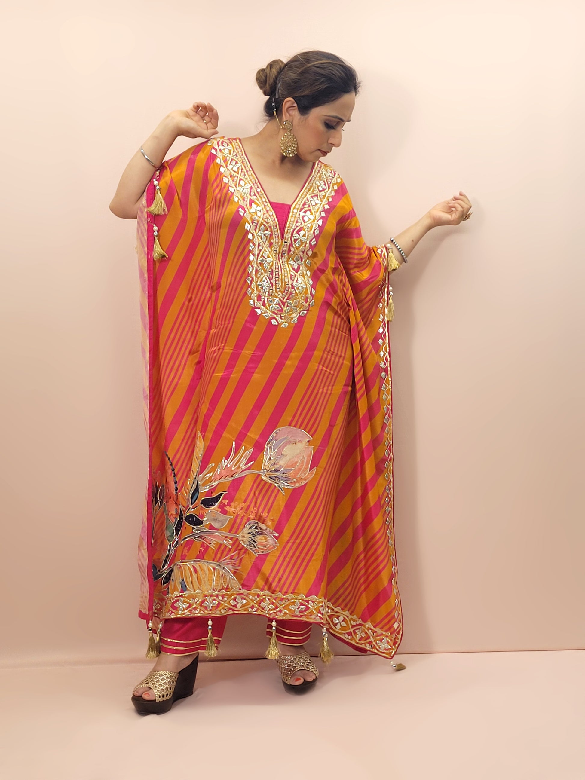 Orange Rani Kaftan with Pants. Gota and Applique work.