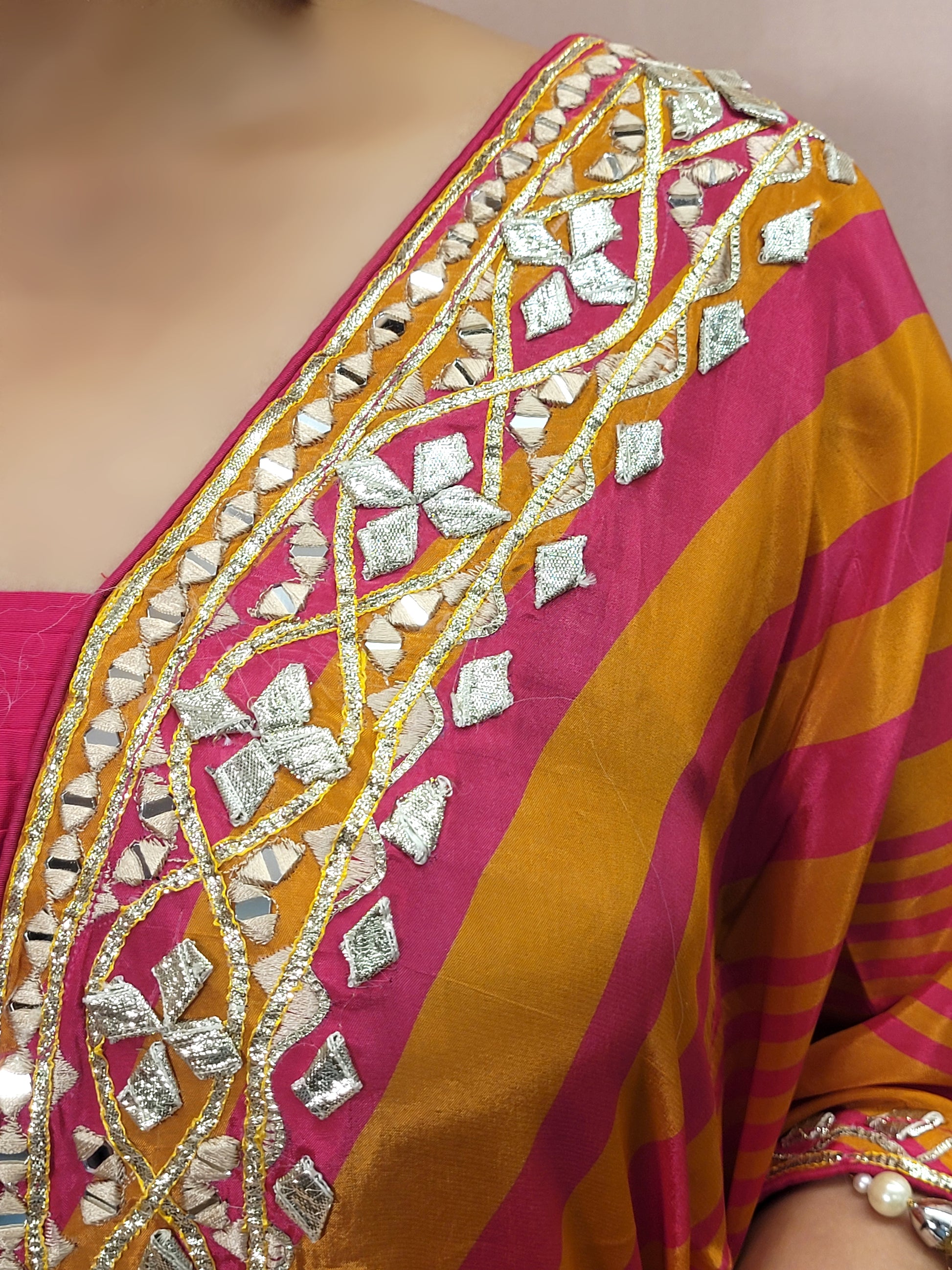 Orange Rani Kaftan with Pants. Gota and Applique work.