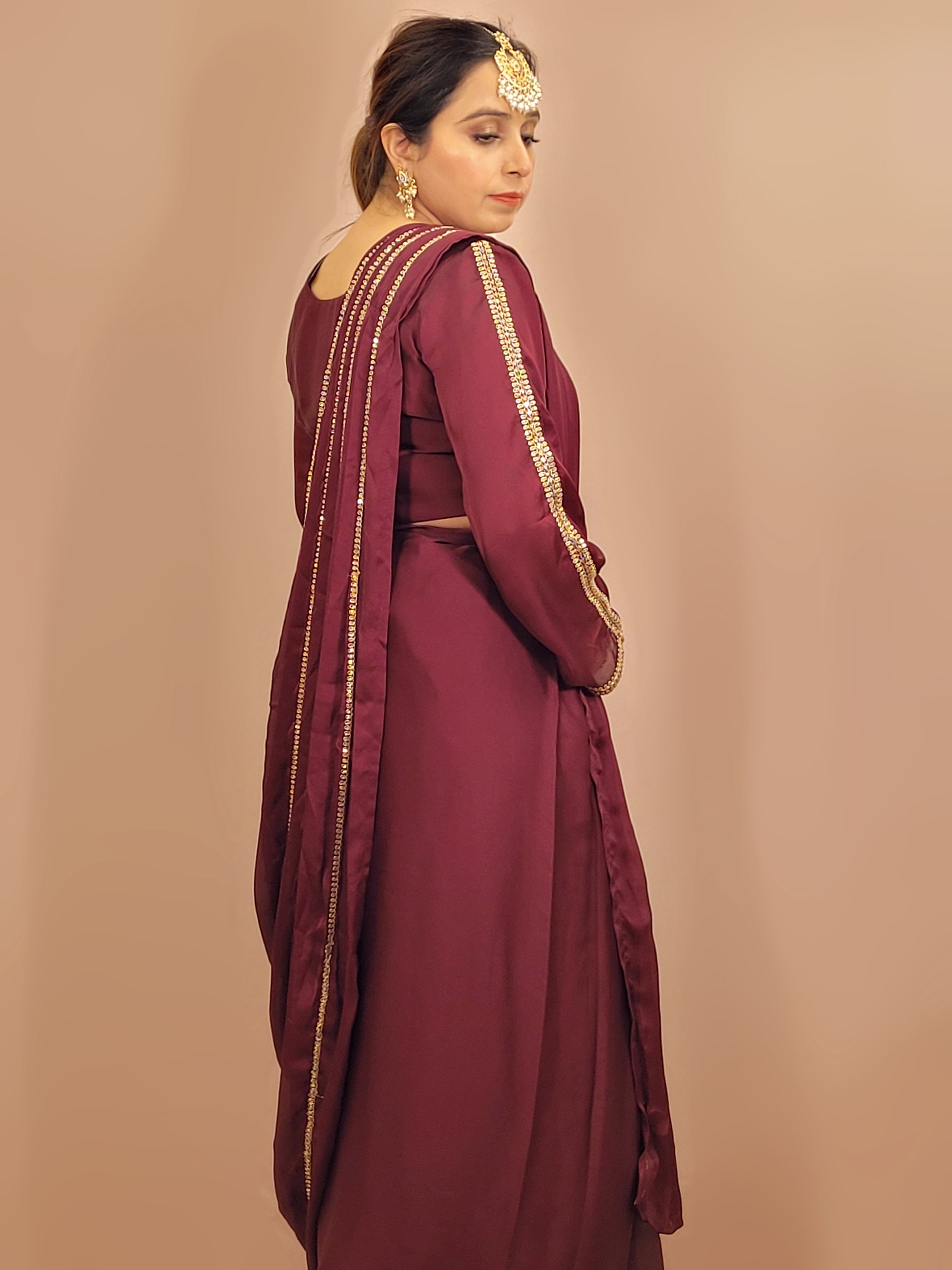 Wine Armani Ready to Wear Saree with Stitched Blouse. Zari Resham and Cutdana work on Blouse and Palla.