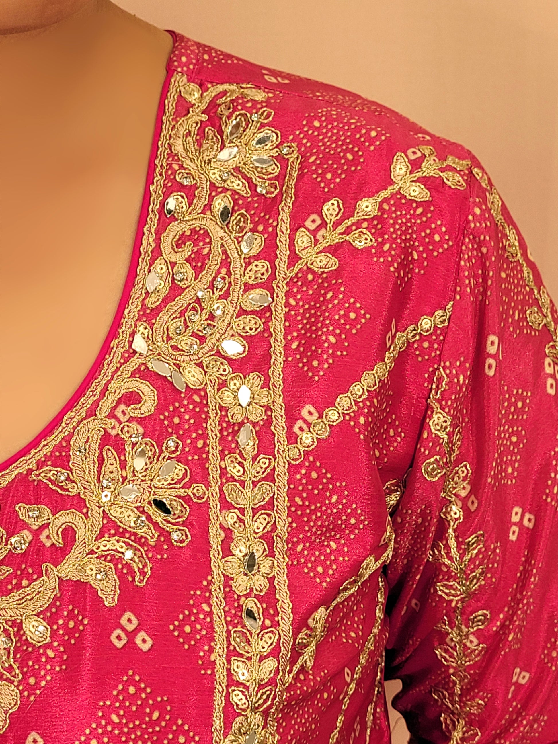 Rani Pink and Orange Shaded Kameez. Rani Sharara and Dupatta. Heavy Embroidery. Zari, Sequins and Mirror.