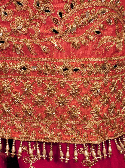 Rani Pink and Orange Shaded Kameez. Rani Sharara and Dupatta. Heavy Embroidery. Zari, Sequins and Mirror.
