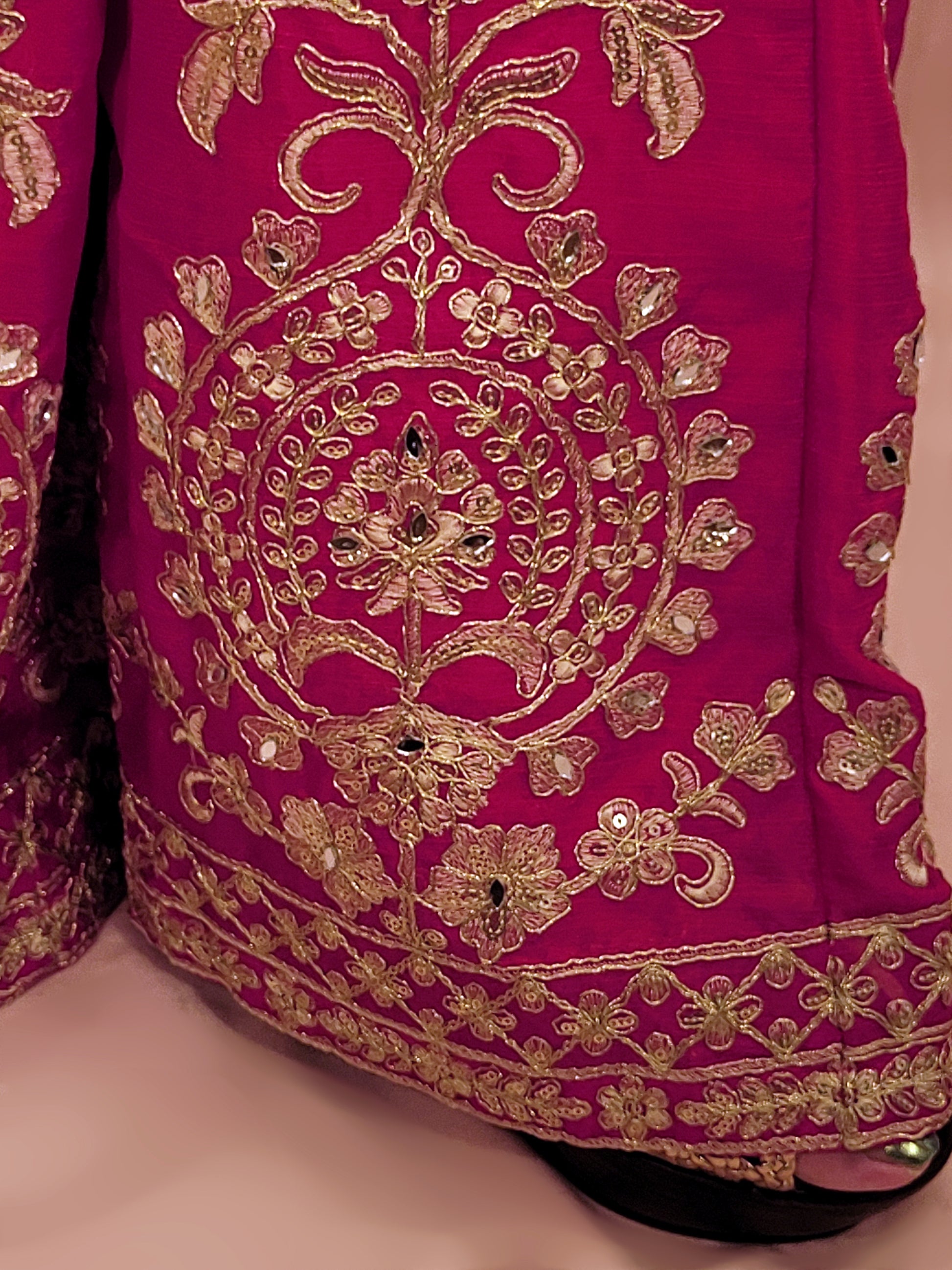Rani Pink and Orange Shaded Kameez. Rani Sharara and Dupatta. Heavy Embroidery. Zari, Sequins and Mirror.