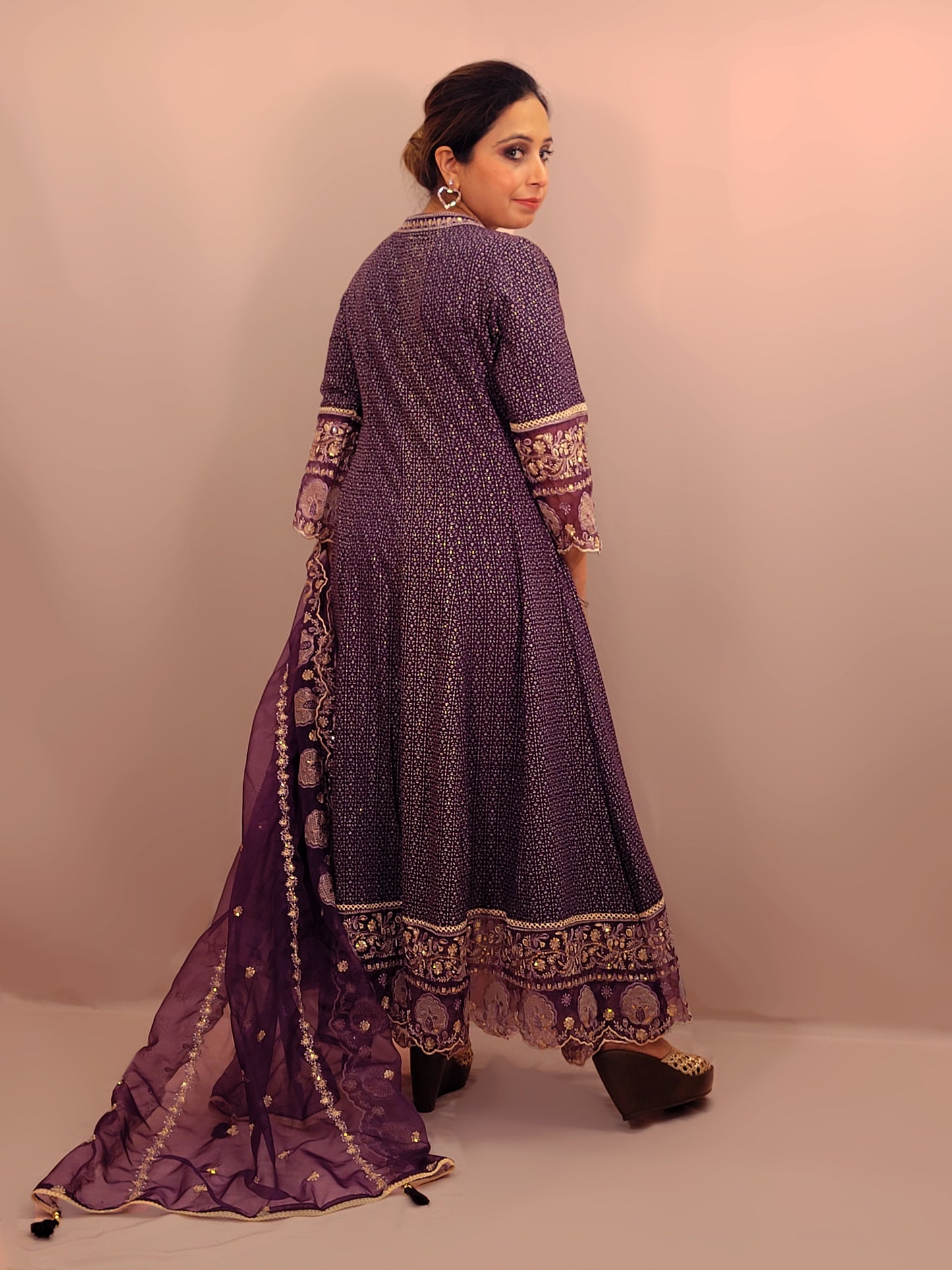 Rayon Purple Anarkali with Pant and Dupatta. Printed Base. Resham and Lace Work with sequins and mirror highlights.