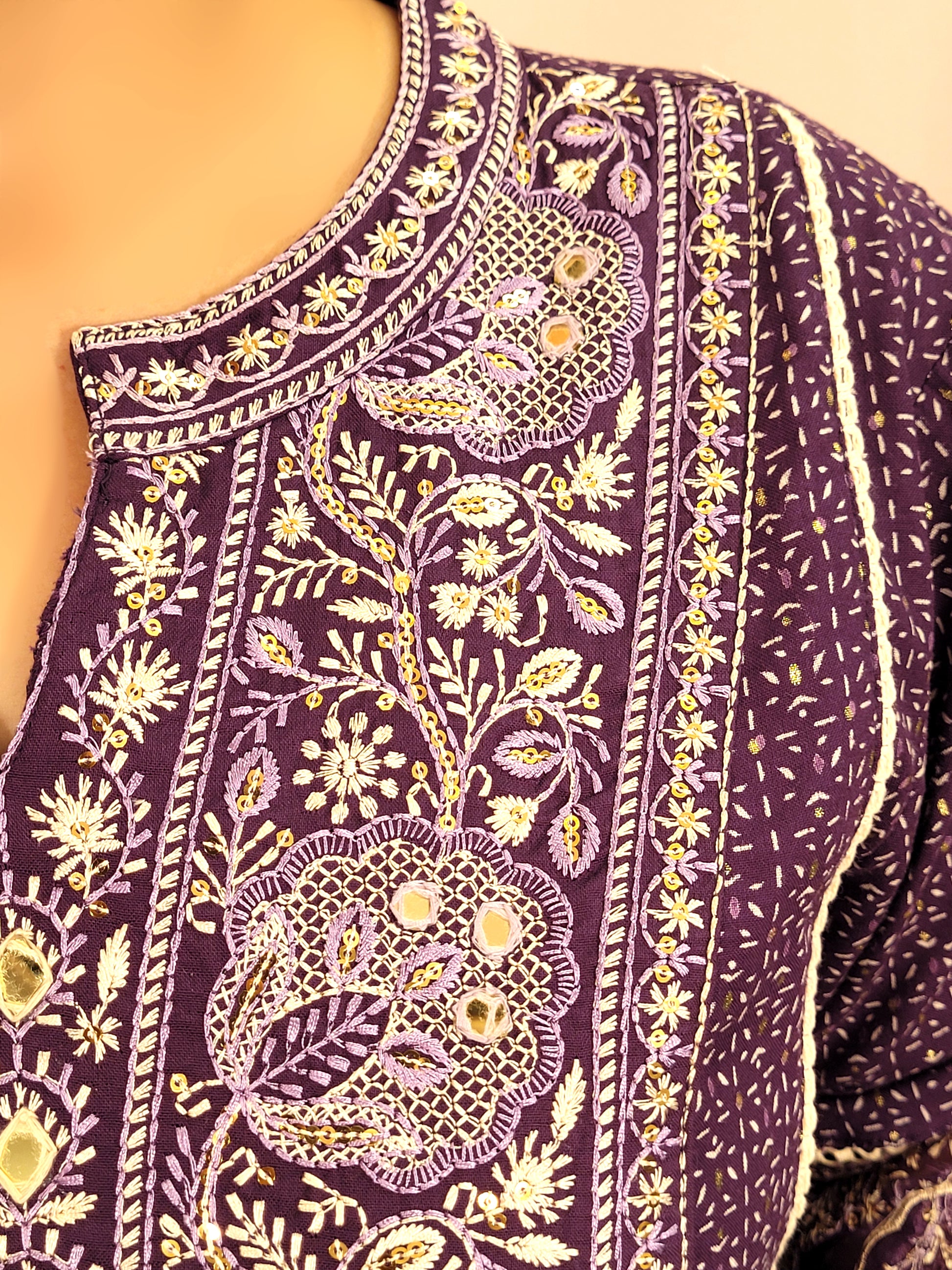 Rayon Purple Anarkali with Pant and Dupatta. Printed Base. Resham and Lace Work with sequins and mirror highlights.