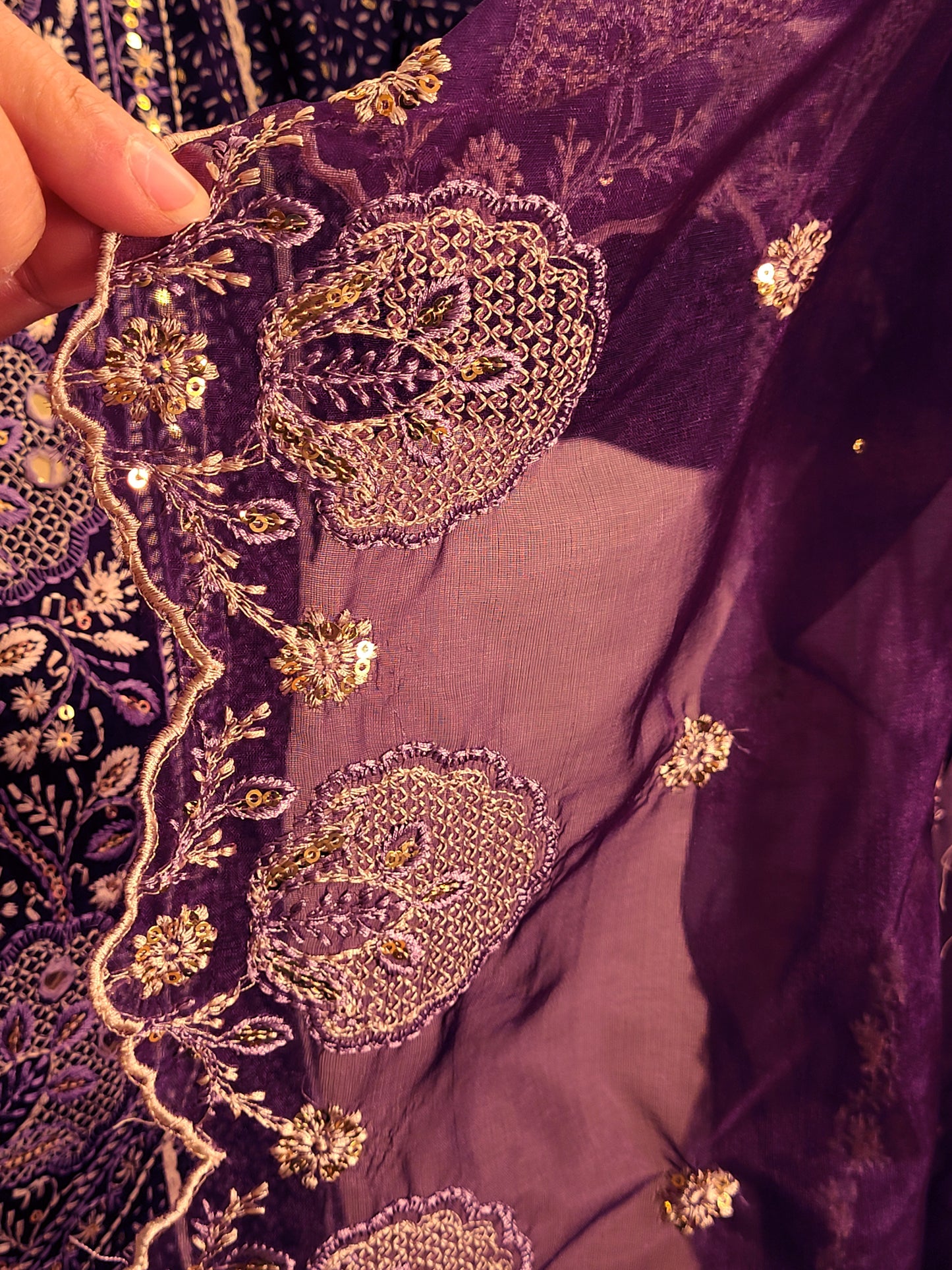 Rayon Purple Anarkali with Pant and Dupatta. Printed Base. Resham and Lace Work with sequins and mirror highlights.