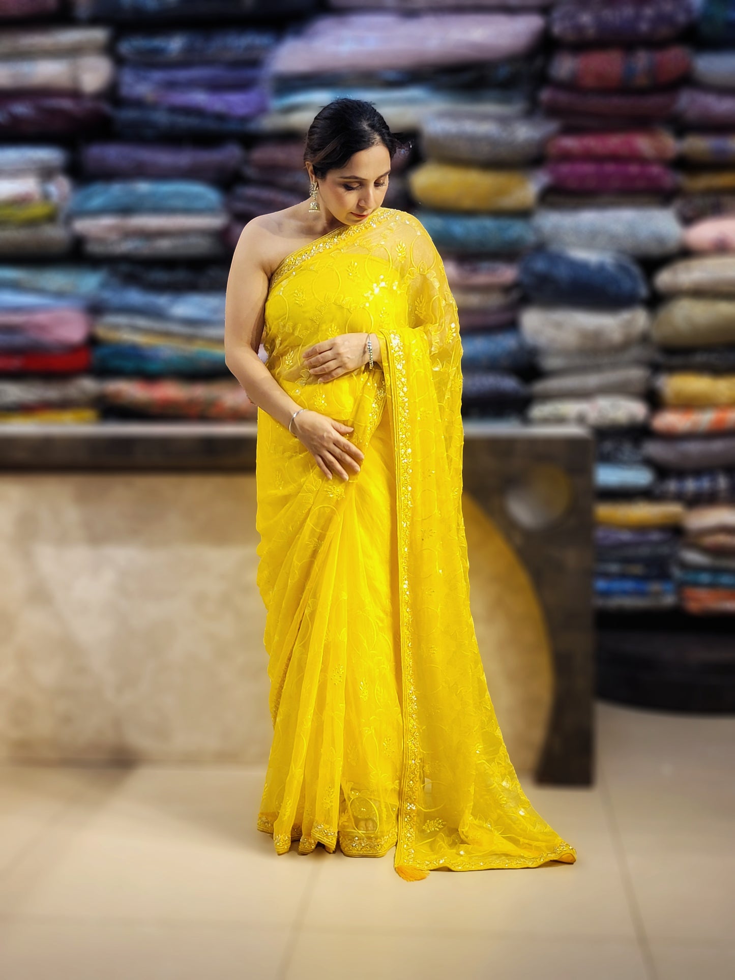 Yellow Chiffon Saree with Resham, Beads, Sequins and Mirror Work.