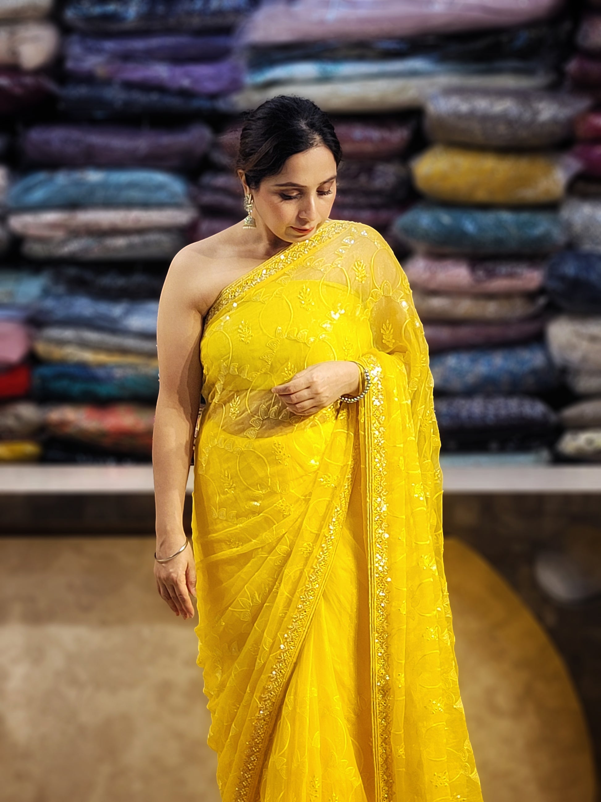 Yellow Chiffon Saree with Resham, Beads, Sequins and Mirror Work.