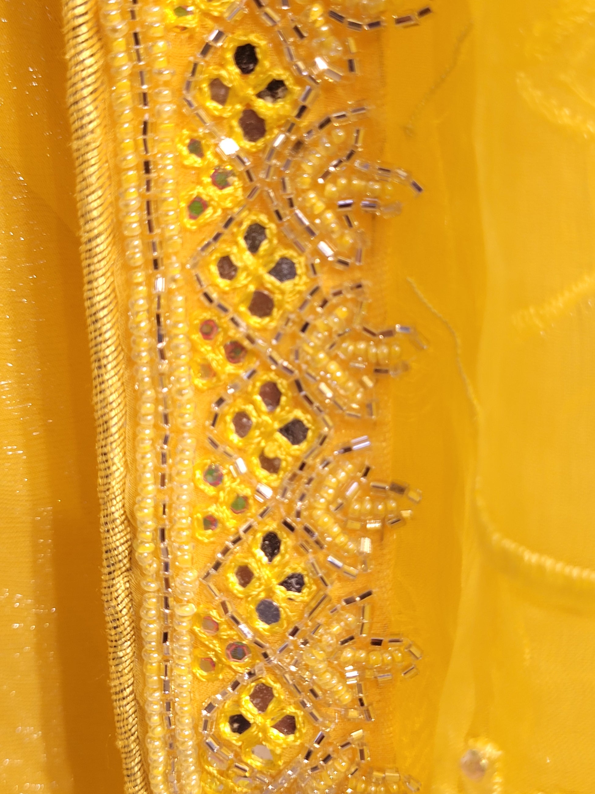 Yellow Chiffon Saree with Resham, Beads, Sequins and Mirror Work.