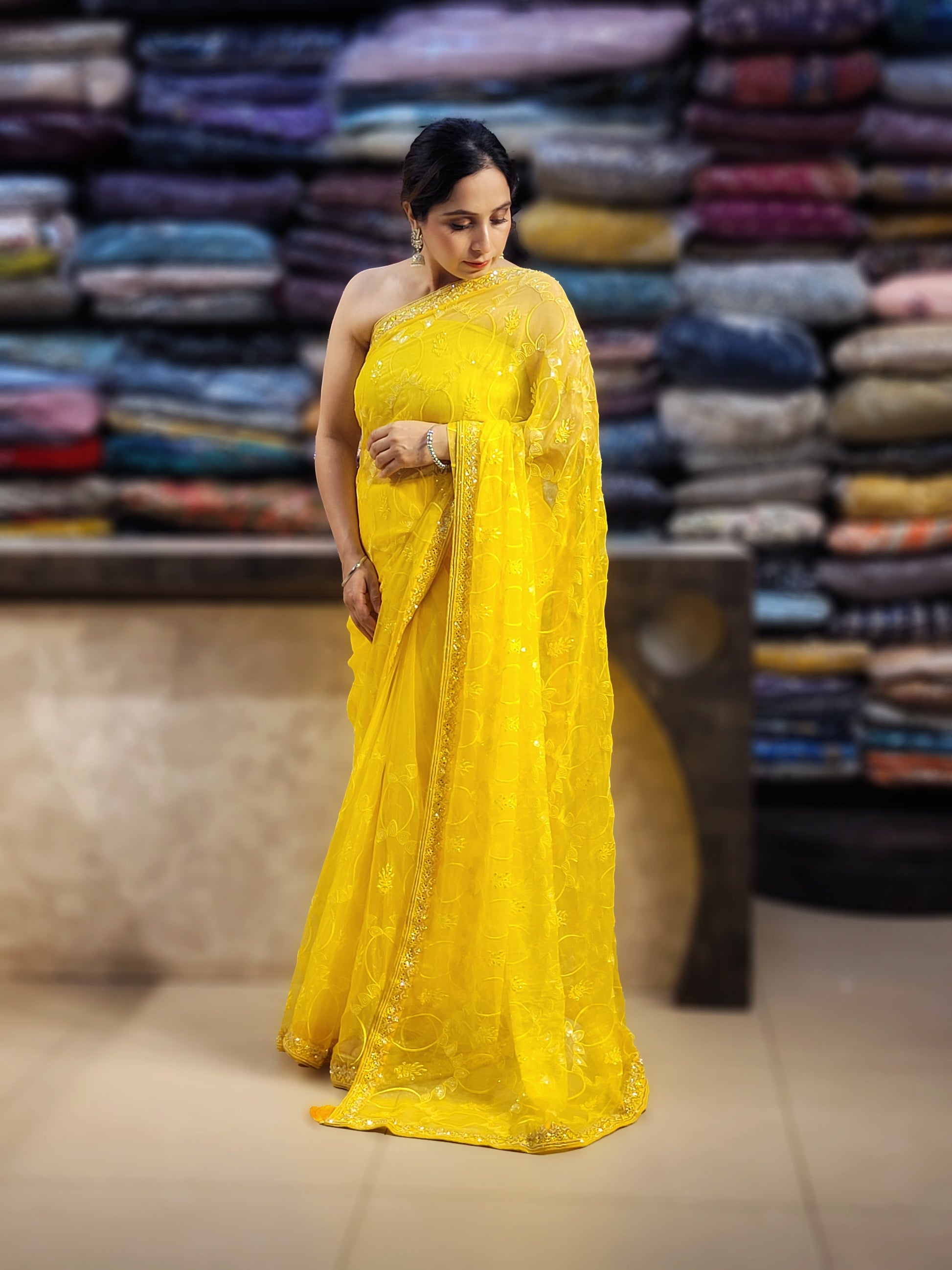 Yellow Chiffon Saree with Resham, Beads, Sequins and Mirror Work.
