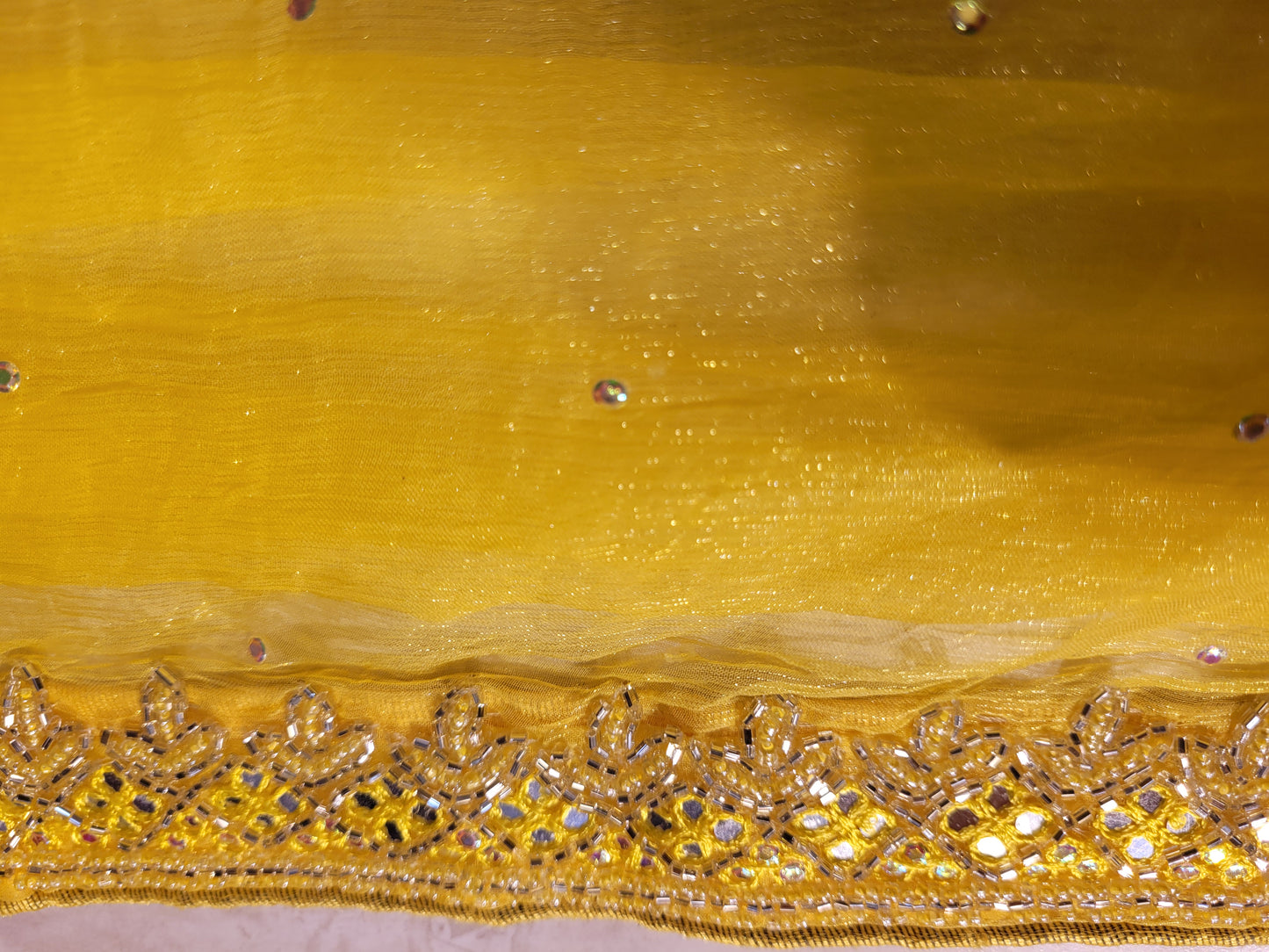 Yellow Chiffon Saree with Resham, Beads, Sequins and Mirror Work.