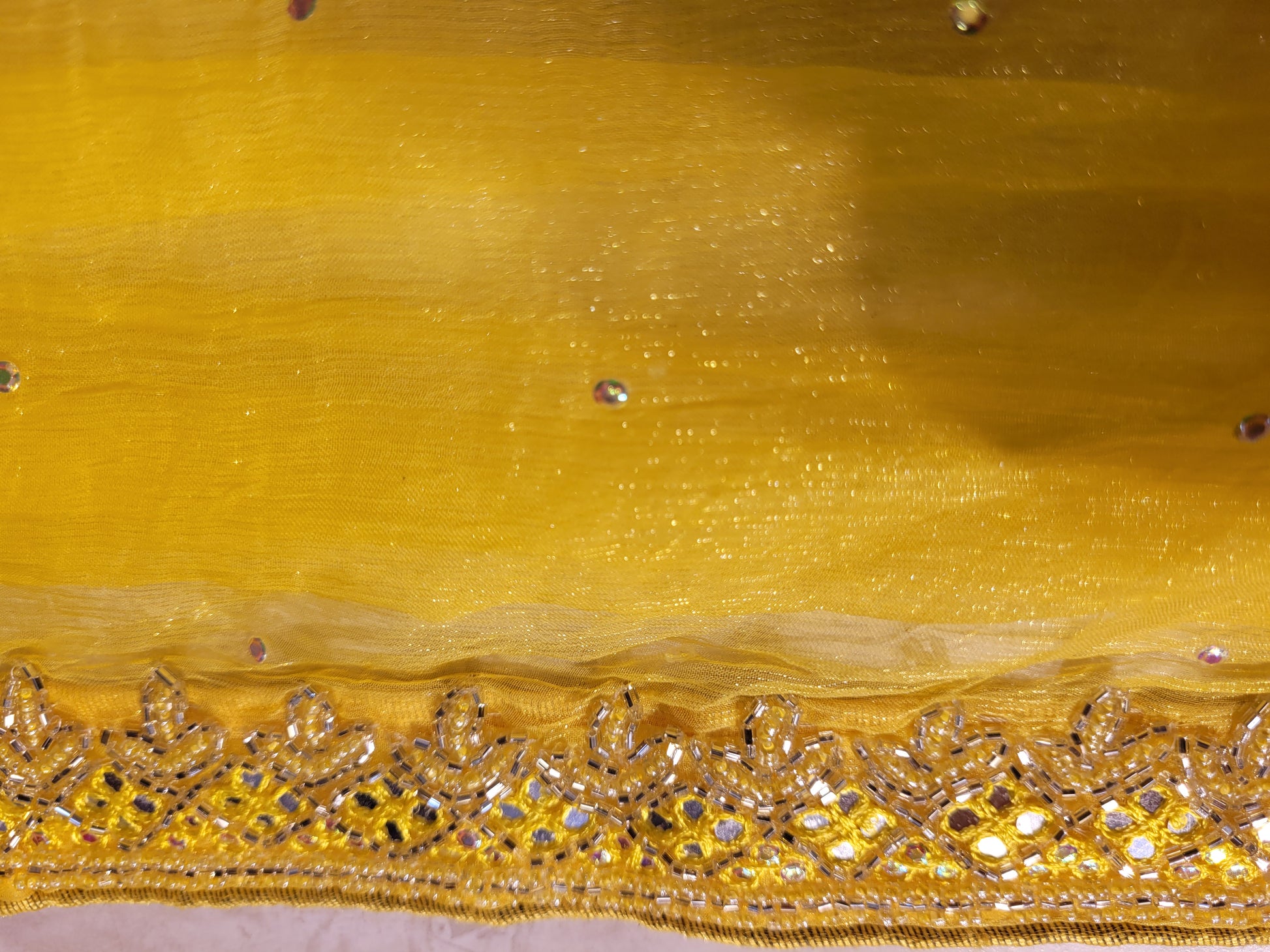 Yellow Chiffon Saree with Resham, Beads, Sequins and Mirror Work.