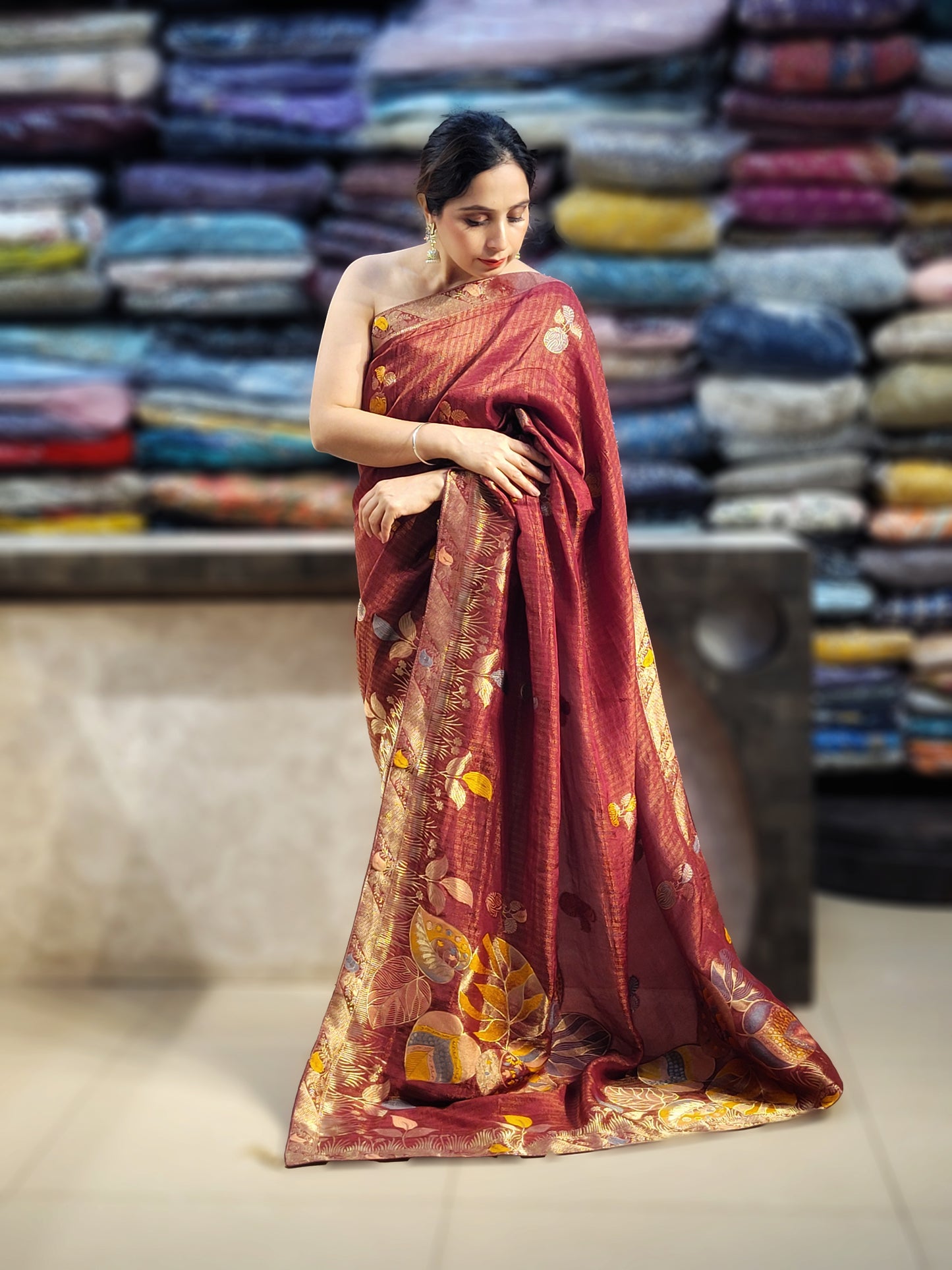 Rust Maroon Tissue Crepe Multicolor Weave Saree. Matching Unstitched Blouse Piece included.