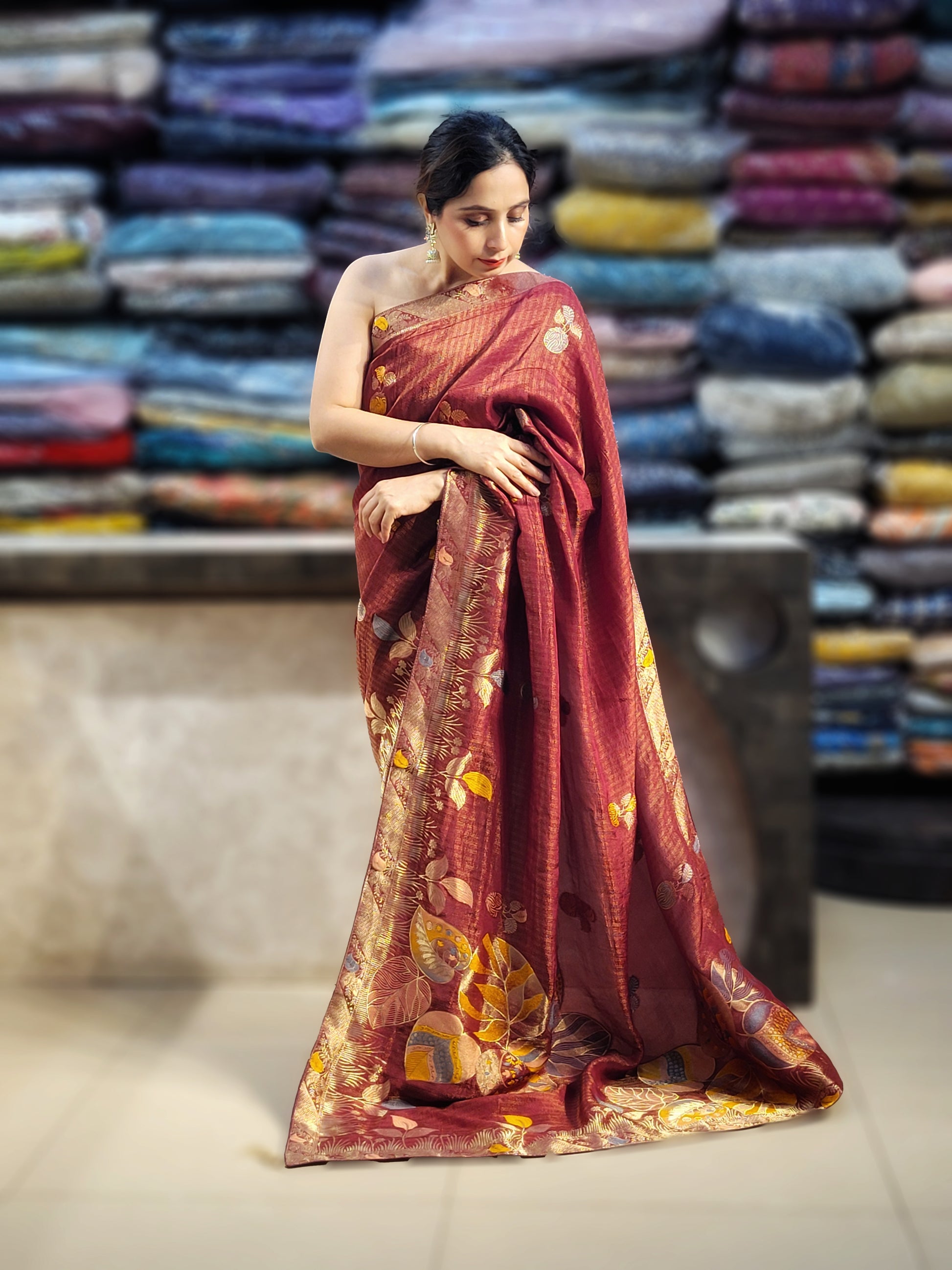 Rust Maroon Tissue Crepe Multicolor Weave Saree. Matching Unstitched Blouse Piece included.