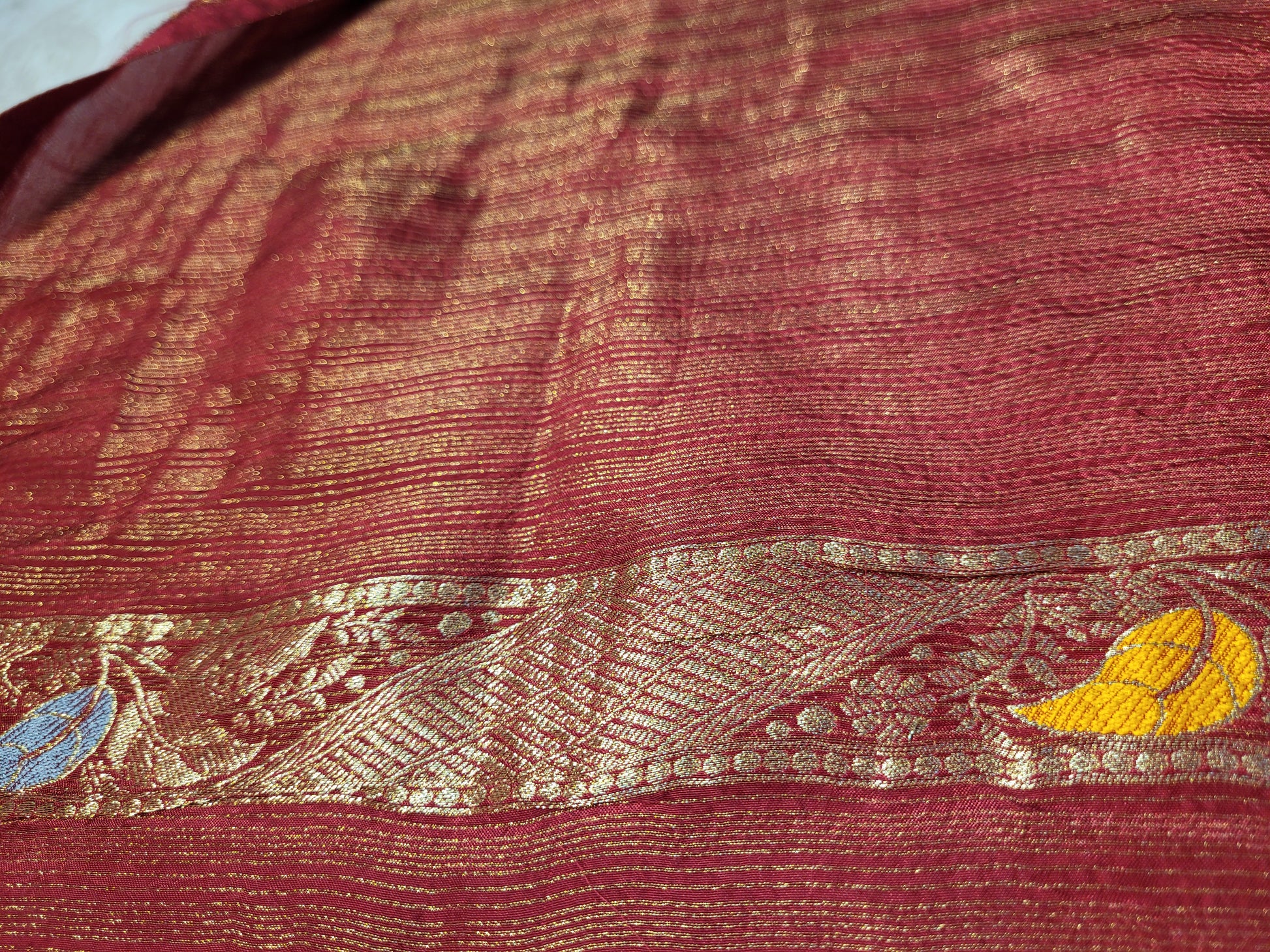 Rust Maroon Tissue Crepe Multicolor Weave Saree. Matching Unstitched Blouse Piece included.