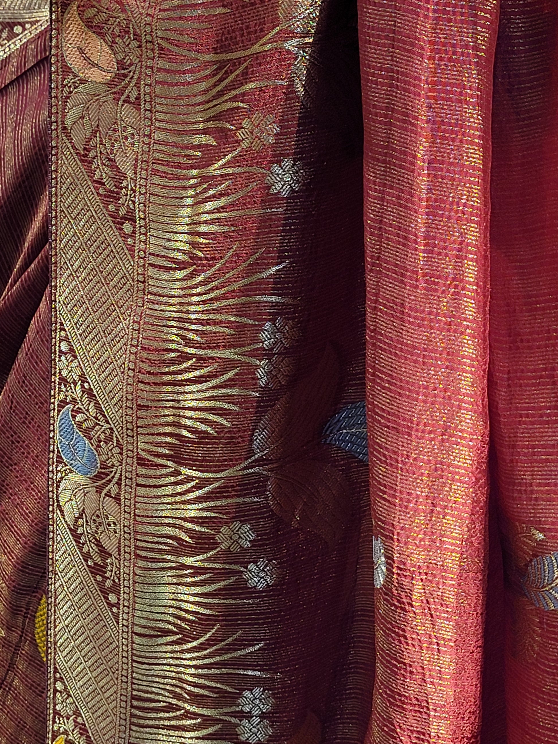 Rust Maroon Tissue Crepe Multicolor Weave Saree. Matching Unstitched Blouse Piece included.