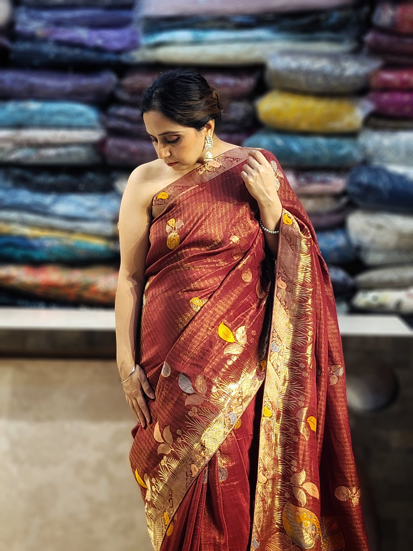Rust Maroon Tissue Crepe Multicolor Weave Saree. Matching Unstitched Blouse Piece included.