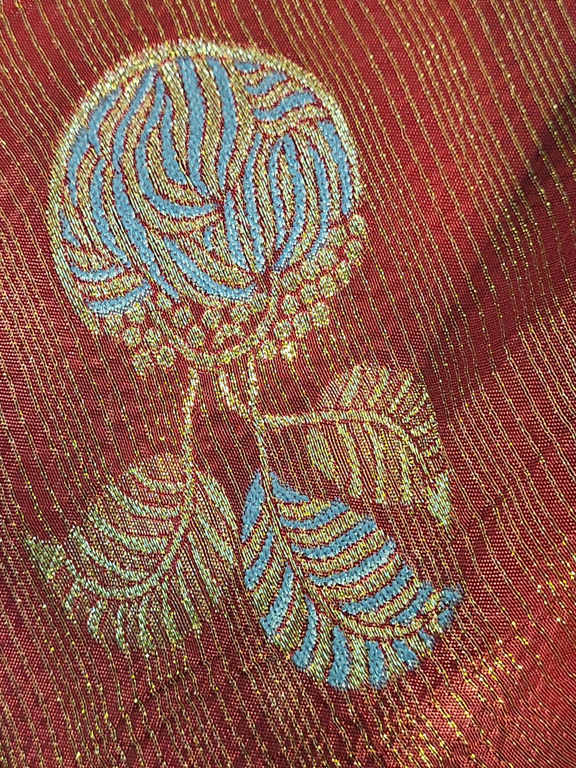 Rust Maroon Tissue Crepe Multicolor Weave Saree. Matching Unstitched Blouse Piece included.