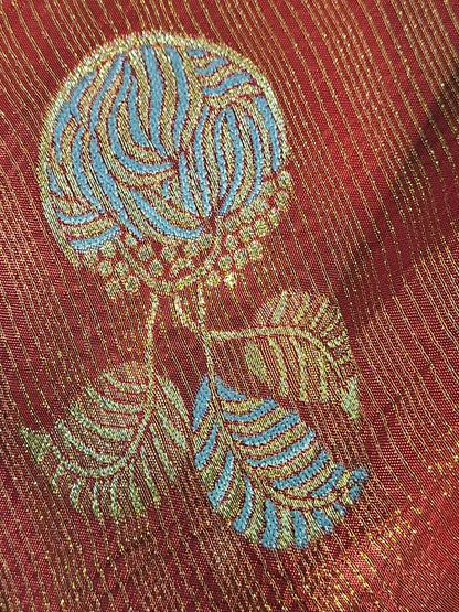 Rust Maroon Tissue Crepe Multicolor Weave Saree. Matching Unstitched Blouse Piece included.