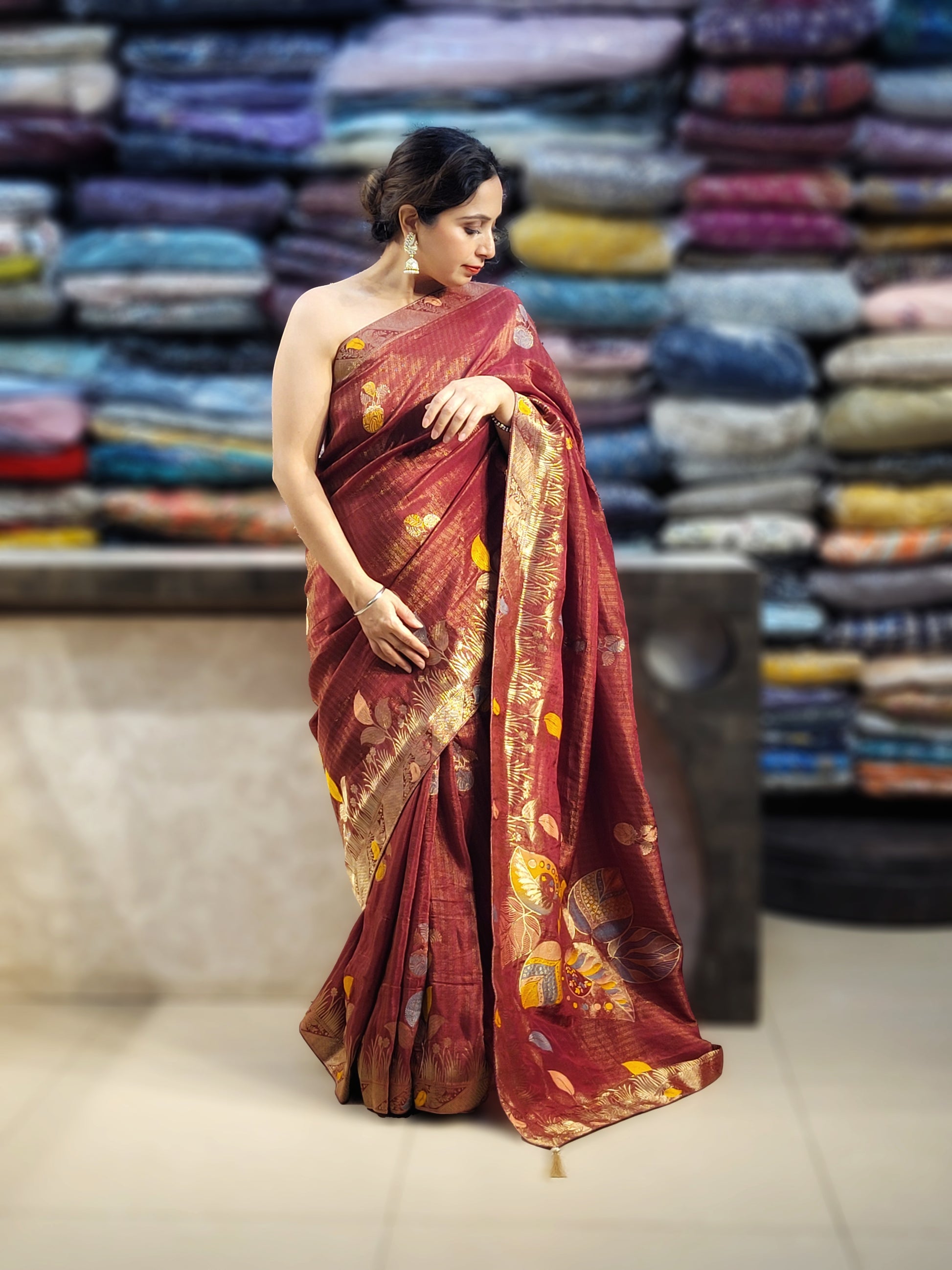 Rust Maroon Tissue Crepe Multicolor Weave Saree. Matching Unstitched Blouse Piece included.
