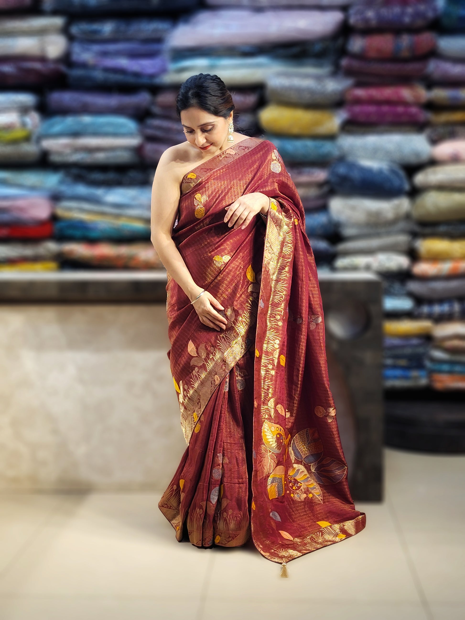 Rust Maroon Tissue Crepe Multicolor Weave Saree. Matching Unstitched Blouse Piece included.