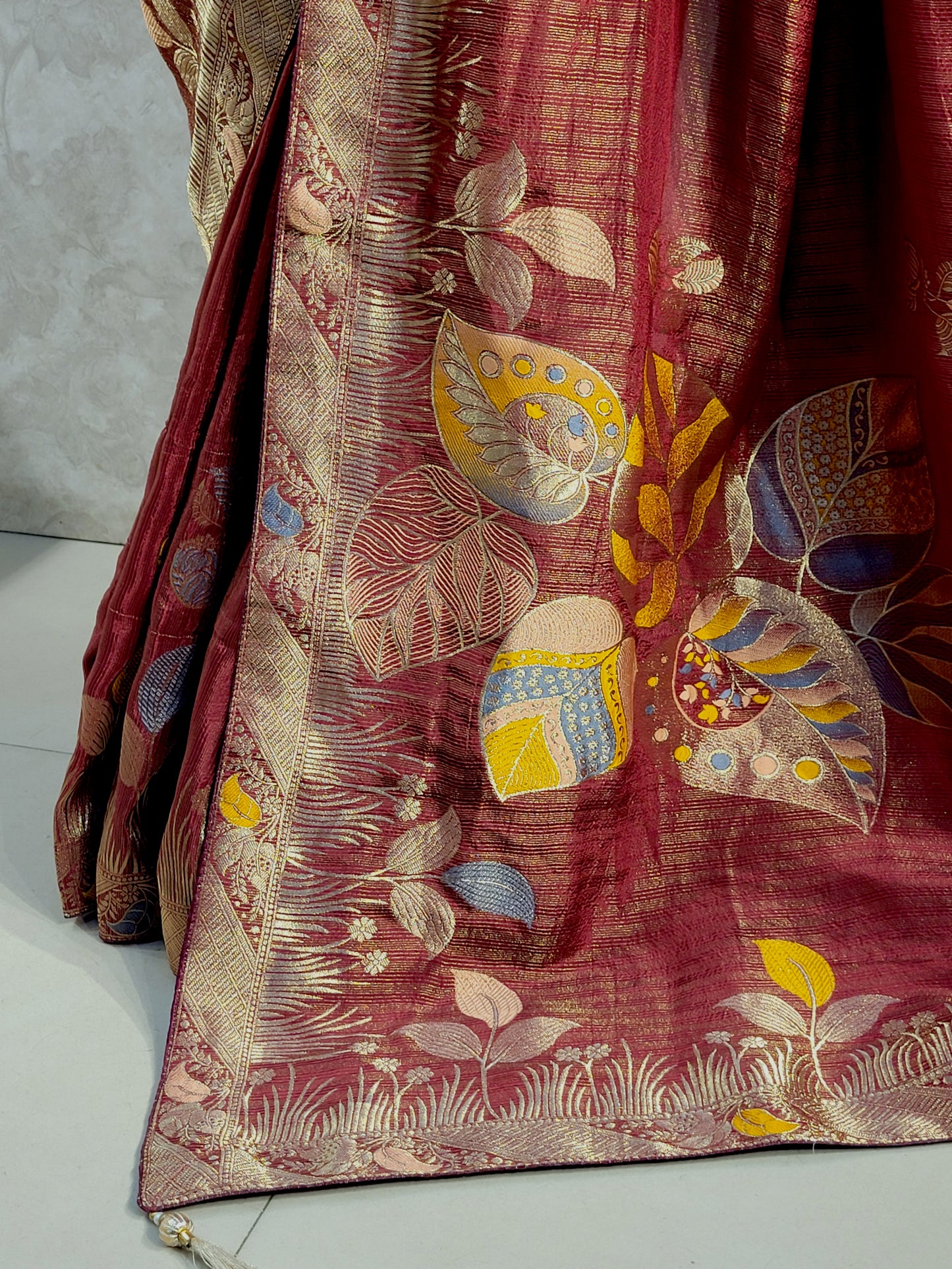 Rust Maroon Tissue Crepe Multicolor Weave Saree. Matching Unstitched Blouse Piece included.
