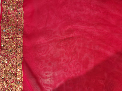 Rani Pink Georgette Banarasi (Khaddi) Bandhni Handwork Saree. Cutdana, Mirror and Sequins highlighting work. Matching unstitched blouse piece included.