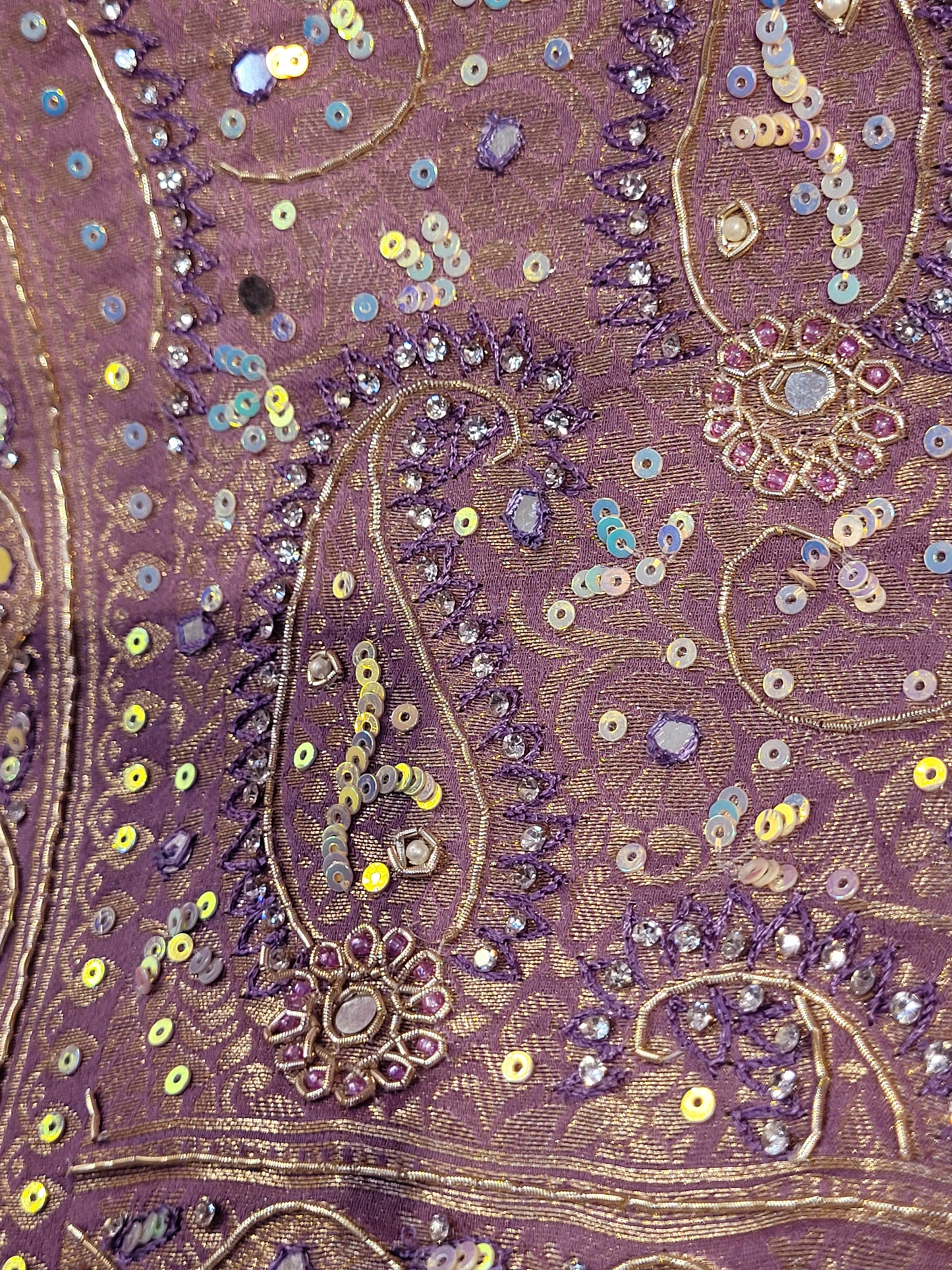 Shimmer Tissue Lavender Handwork Saree. Weaves highlighted with handwork using Dabka, Sequins, Mirror and Resham. Unstitched Blouse Piece included.