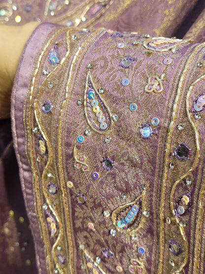 Shimmer Tissue Lavender Handwork Saree. Weaves highlighted with handwork using Dabka, Sequins, Mirror and Resham. Unstitched Blouse Piece included.