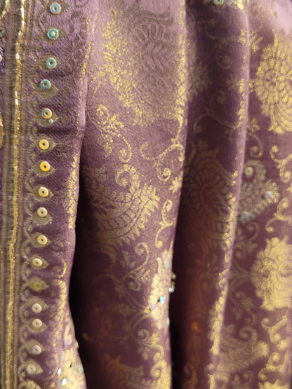 Shimmer Tissue Lavender Handwork Saree. Weaves highlighted with handwork using Dabka, Sequins, Mirror and Resham. Unstitched Blouse Piece included.