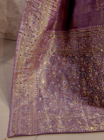 Shimmer Tissue Lavender Handwork Saree. Weaves highlighted with handwork using Dabka, Sequins, Mirror and Resham. Unstitched Blouse Piece included.