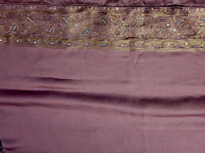 Shimmer Tissue Lavender Handwork Saree. Weaves highlighted with handwork using Dabka, Sequins, Mirror and Resham. Unstitched Blouse Piece included.