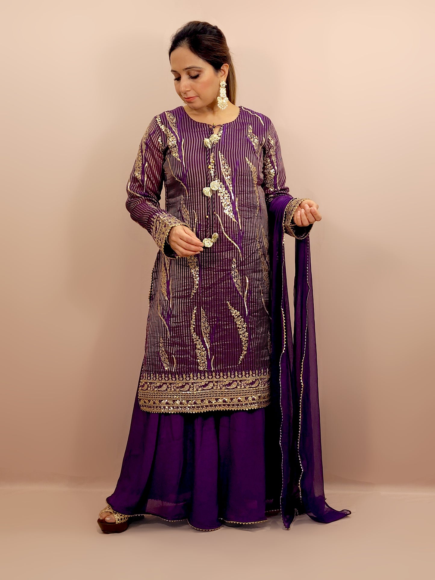 Purple Silk Sharara Suit. Zari, Resham and Sequins work on woven fabric.