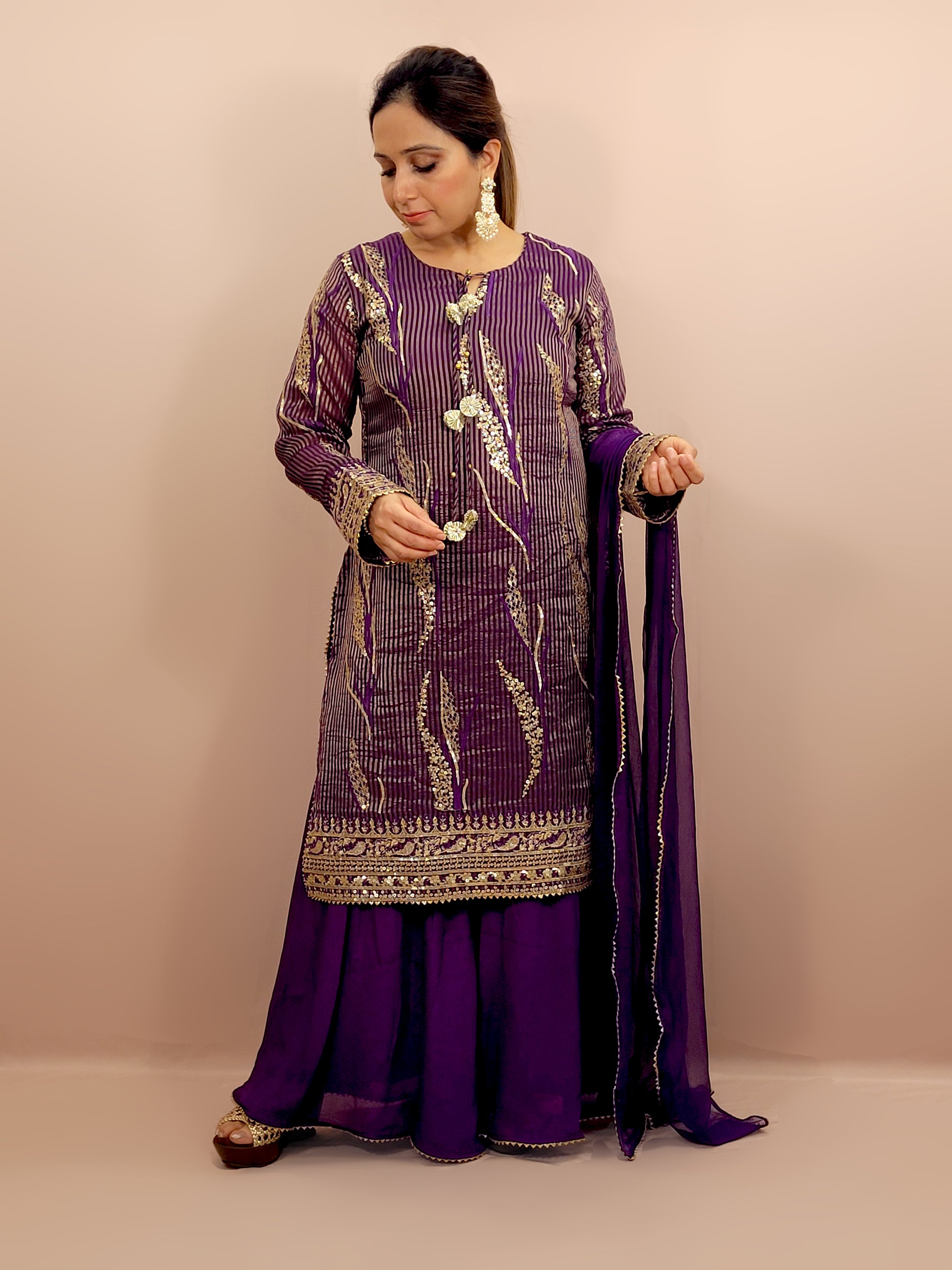 Purple Silk Sharara Suit. Zari, Resham and Sequins work on woven fabric.