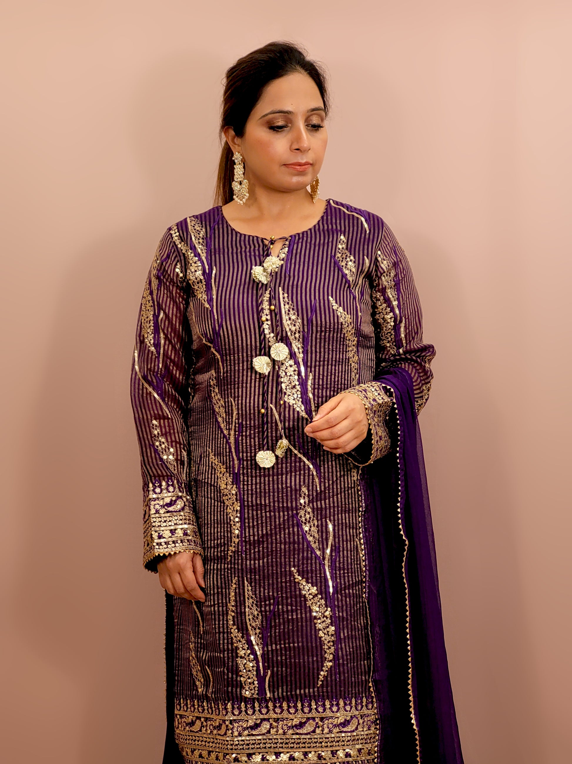 Purple Silk Sharara Suit. Zari, Resham and Sequins work on woven fabric.