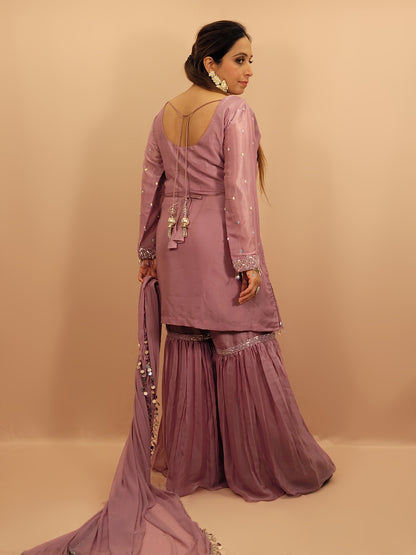 Lavender Tissue Indowestern Dress with Sharara, Sequins and Glass Bead Work. Handwork Belt included. Matching Dupatta with Heavy Lace.