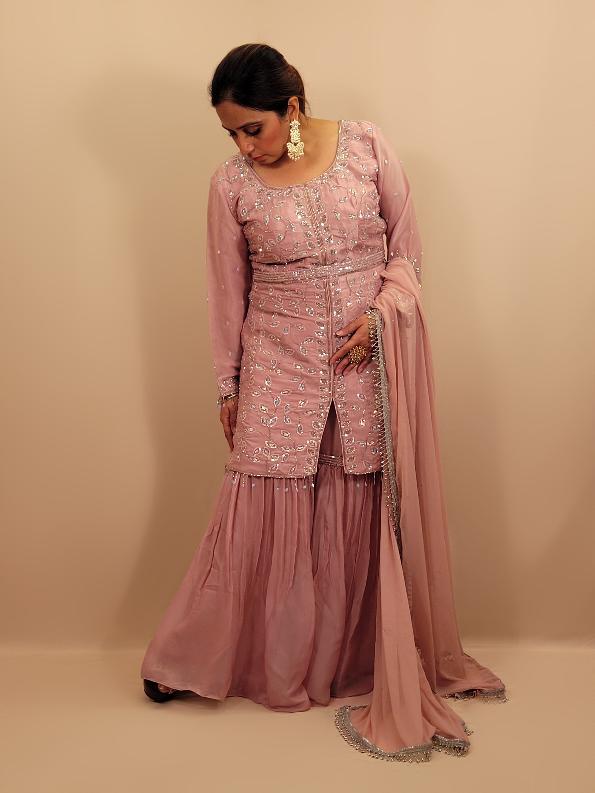 Pink Tissue Indowestern Dress with Sharara, Sequins and Glass Bead Work. Handwork Belt included. Matching Dupatta with Heavy Lace.